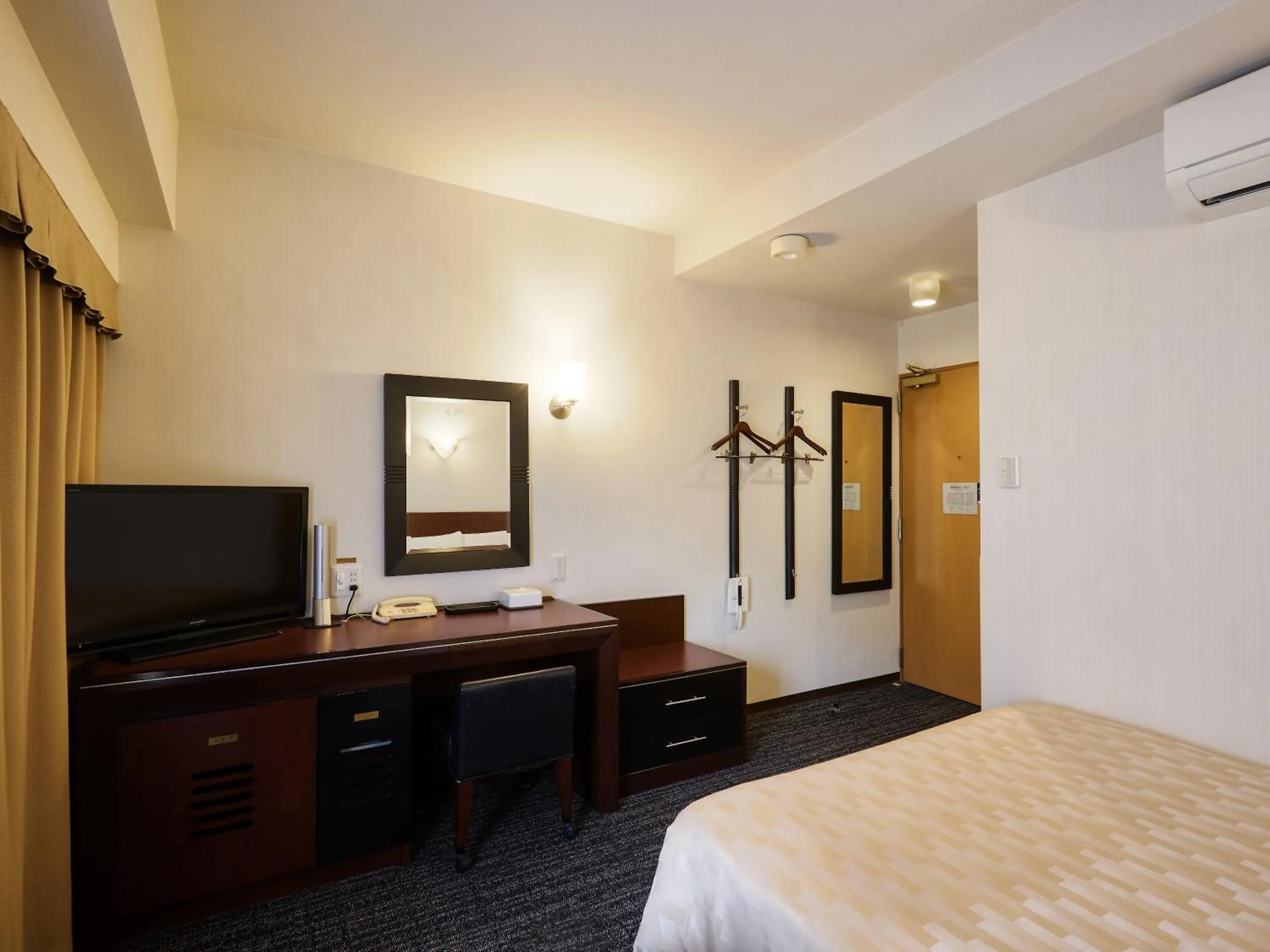 Photo of the whole room, Bed in Hotel Blion Naha