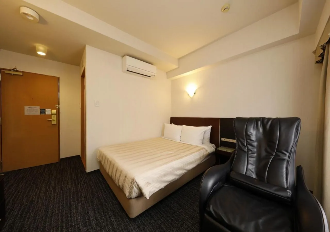 Photo of the whole room, Bed in Hotel Blion Naha