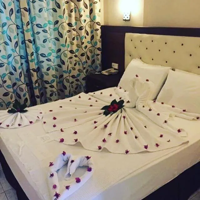 Bed in Ozturk Apart Hotel