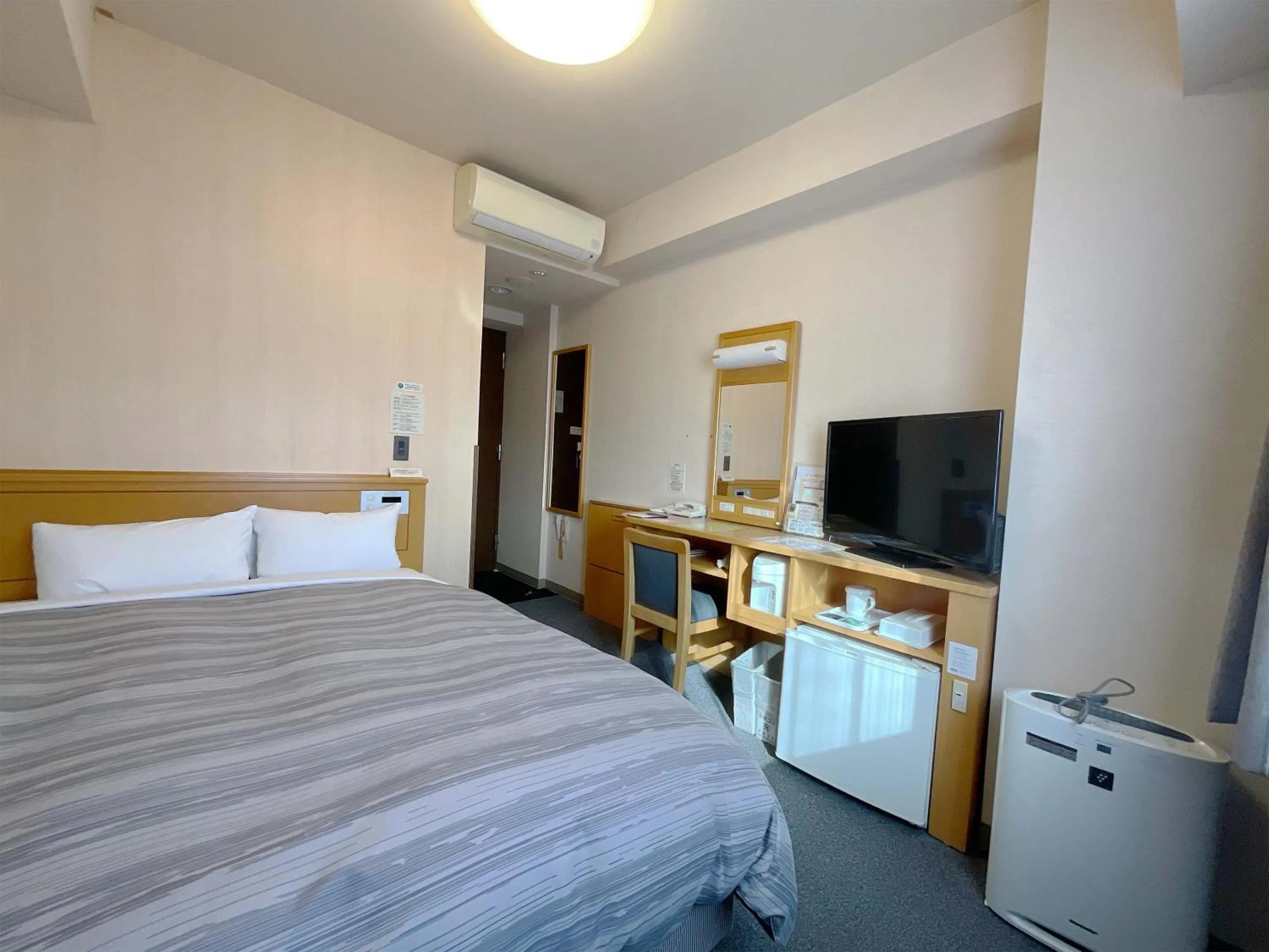 Photo of the whole room, Bed in Hotel Route-Inn Aizuwakamatsu