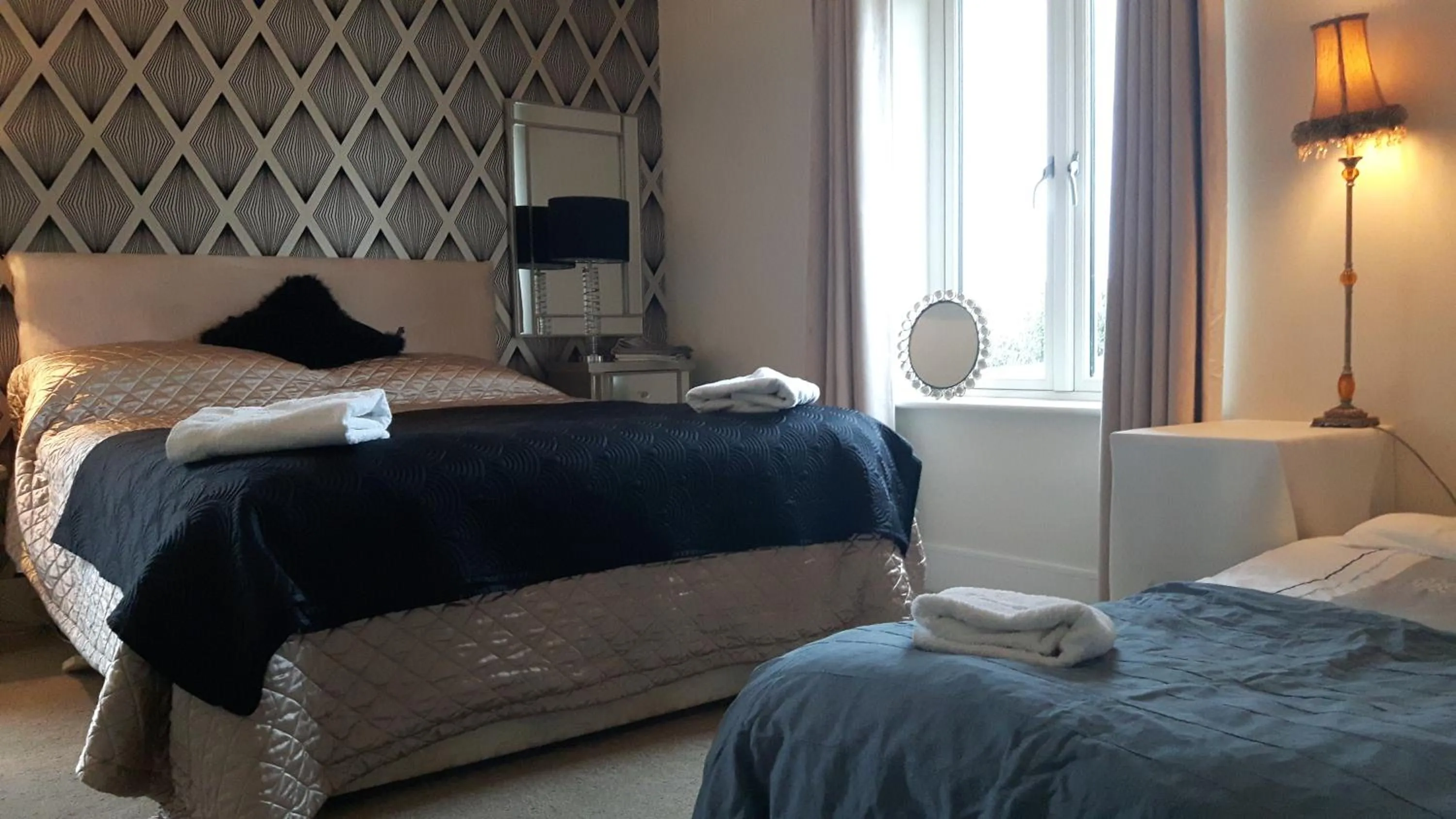 Photo of the whole room, Bed in Brona Dempsey