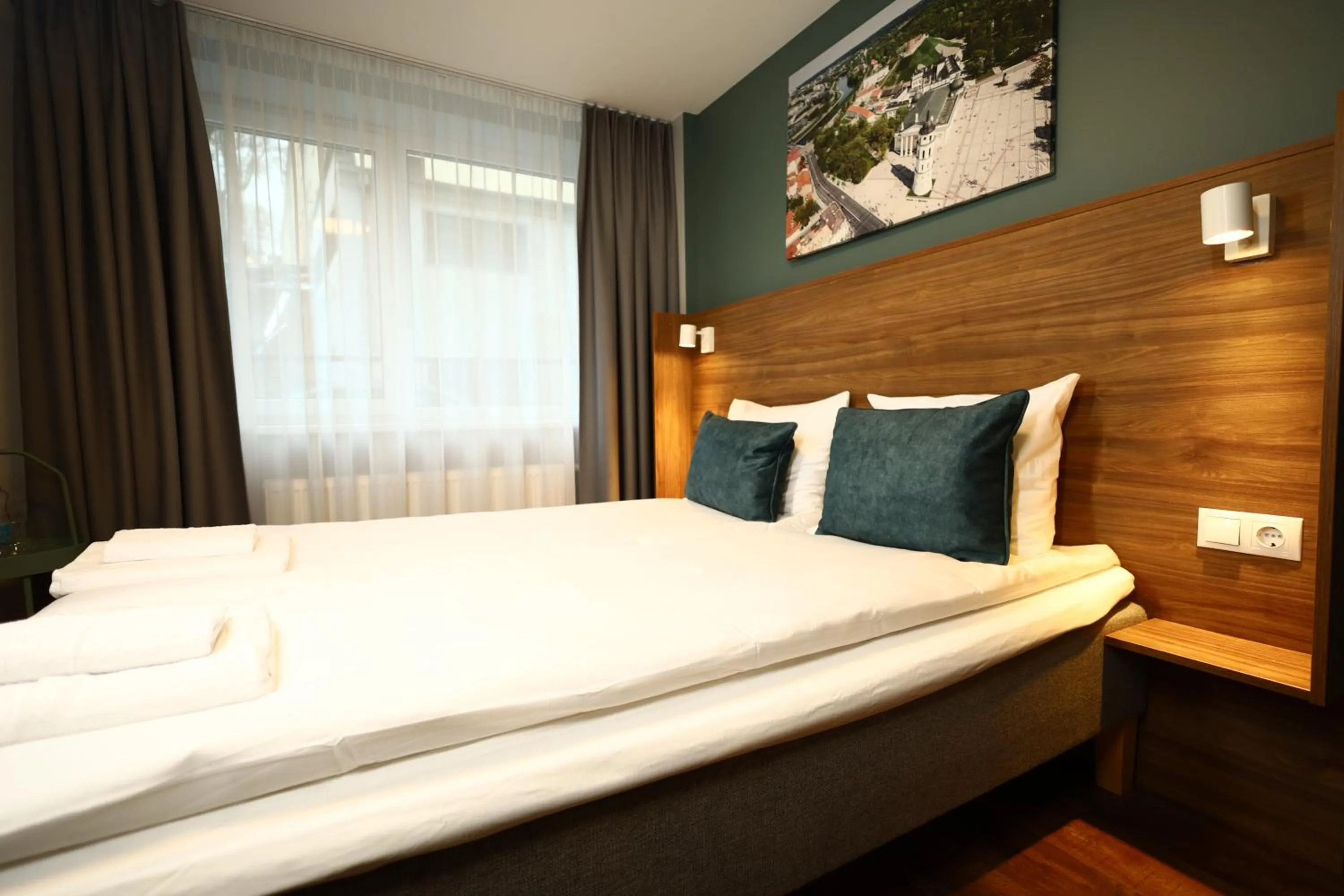 Bed in Stay Vilnius Hotel