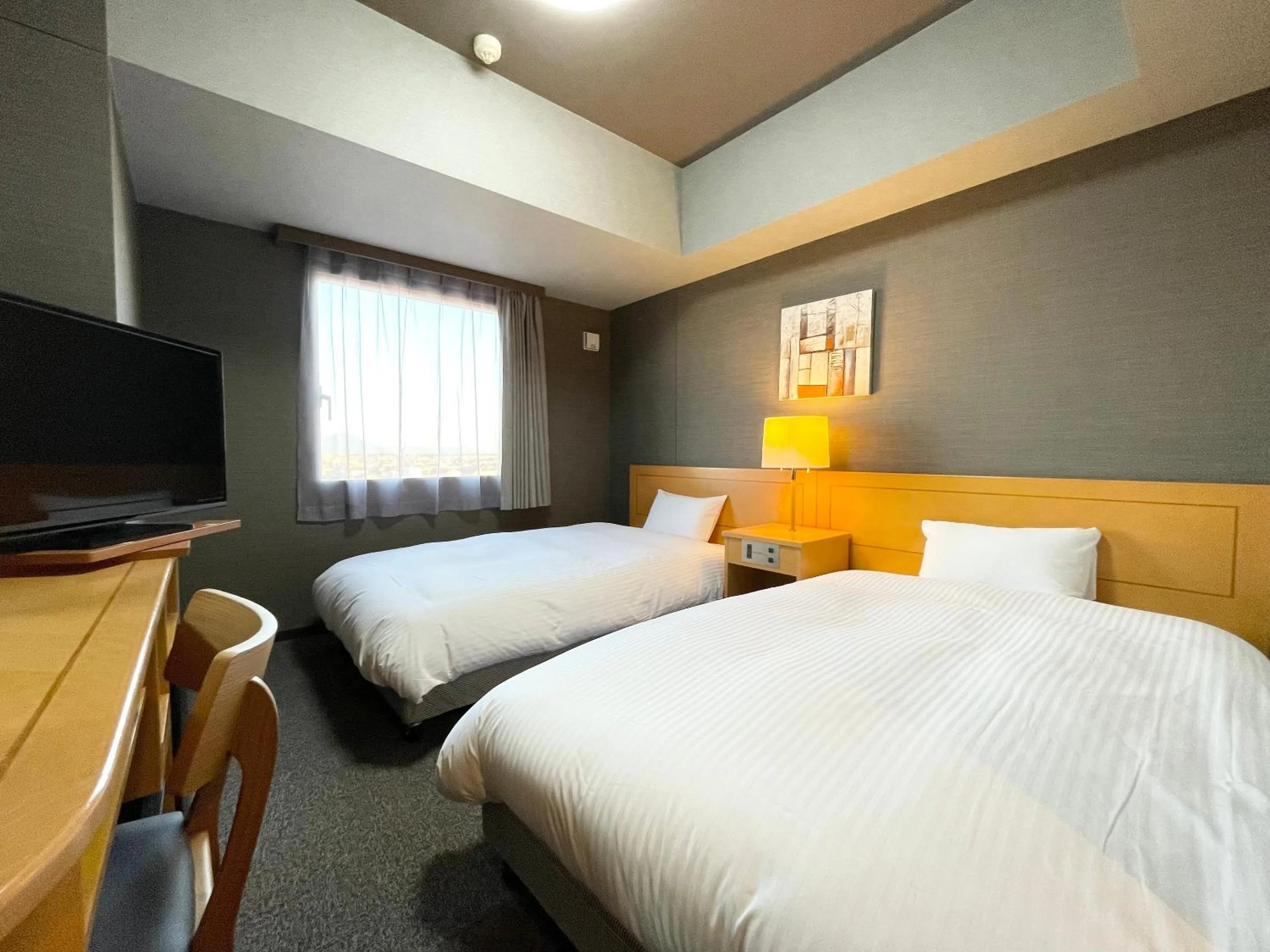 Photo of the whole room, Bed in Hotel Route-Inn Yuki