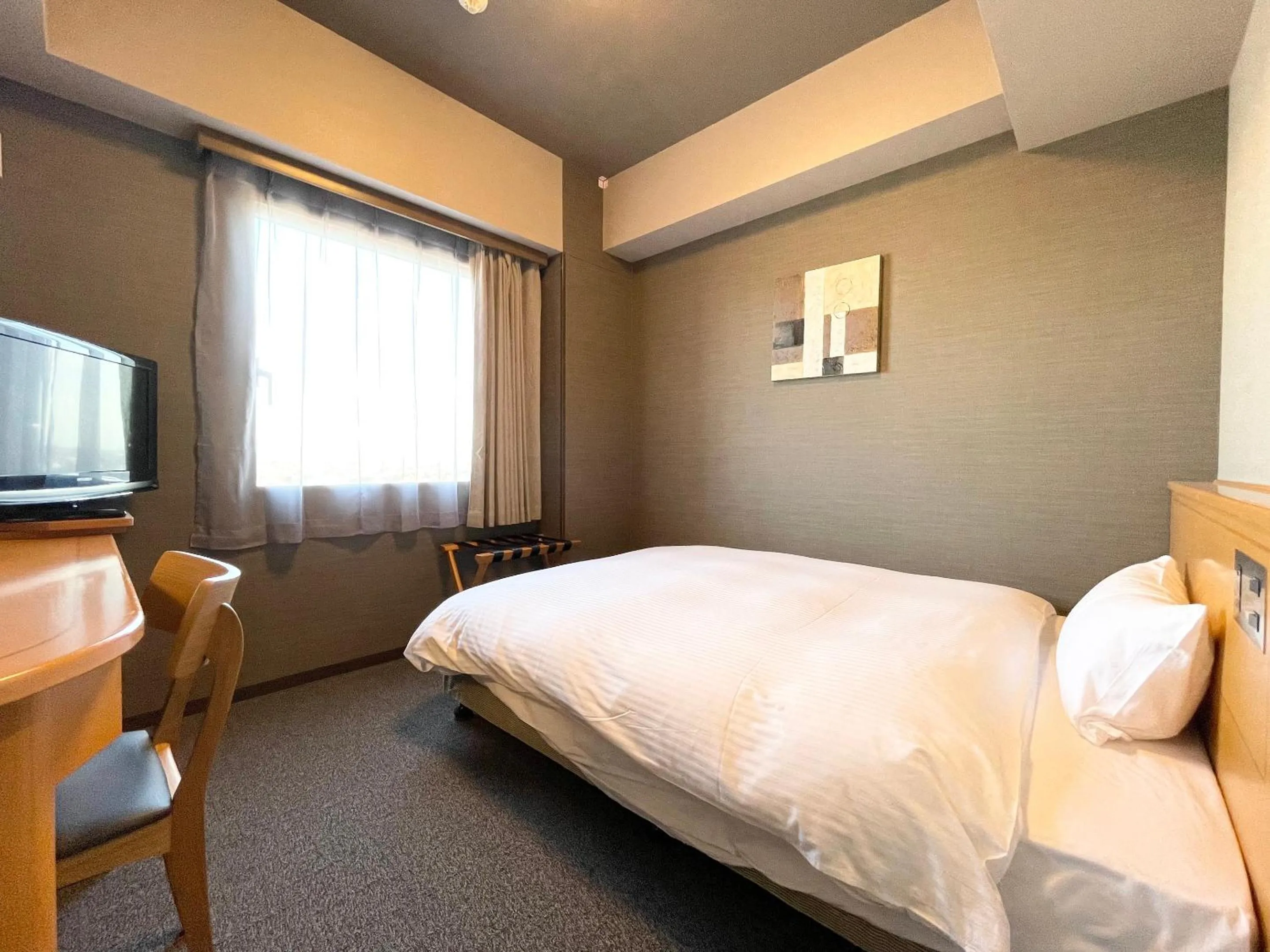 Photo of the whole room, Bed in Hotel Route-Inn Yuki
