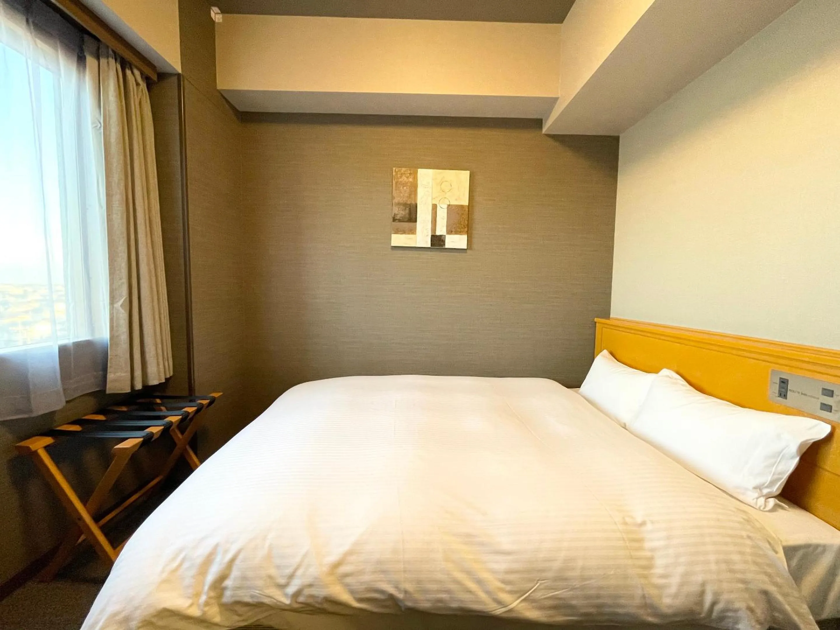 Photo of the whole room, Bed in Hotel Route-Inn Yuki
