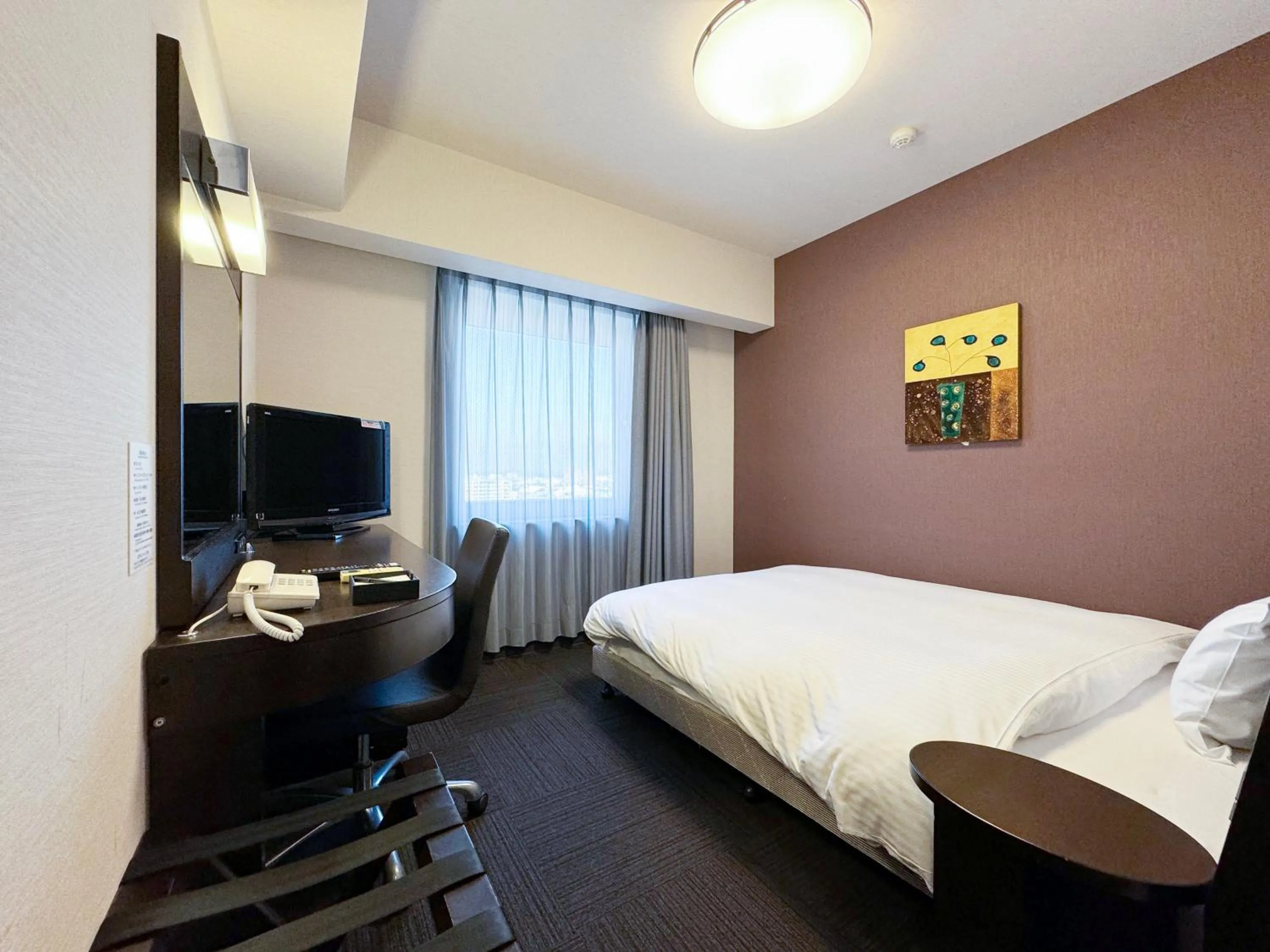 Photo of the whole room, Bed in Hotel Route-Inn Koriyama Minami