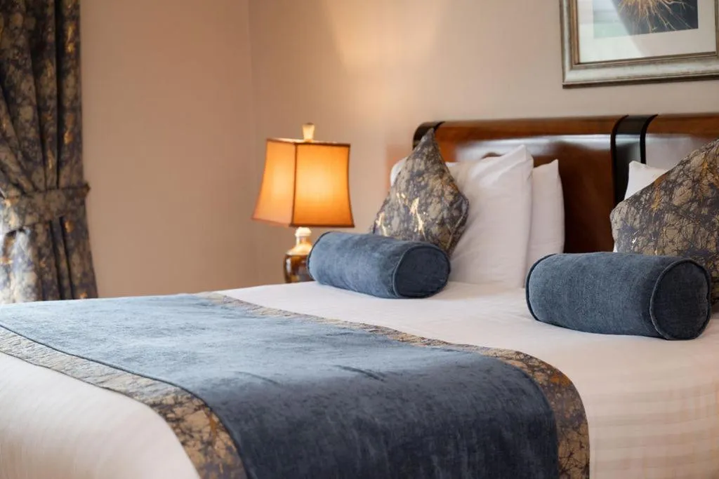 Bed in The Villa Rose Hotel & V-Spa