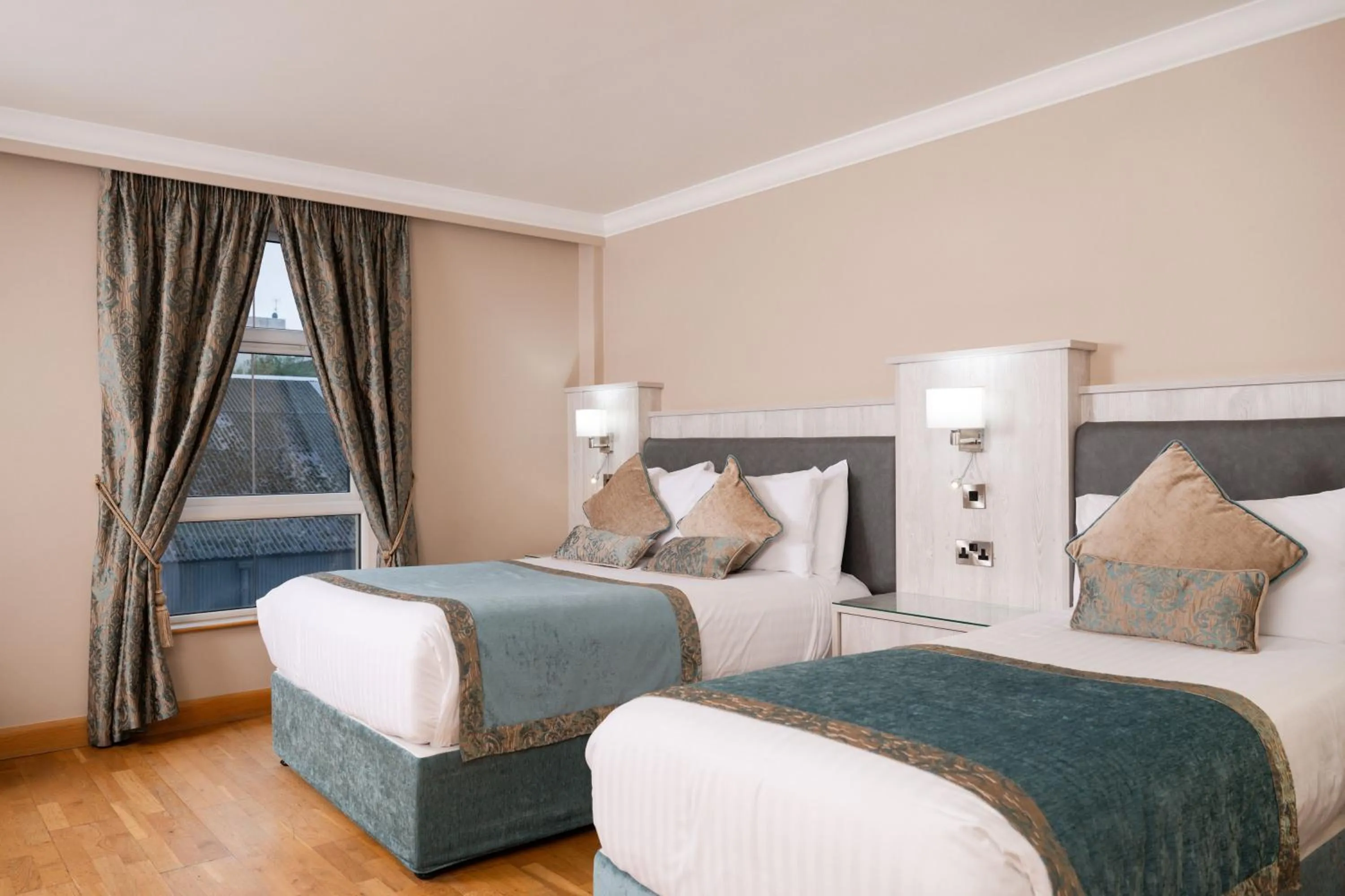 Bed in The Villa Rose Hotel & V-Spa