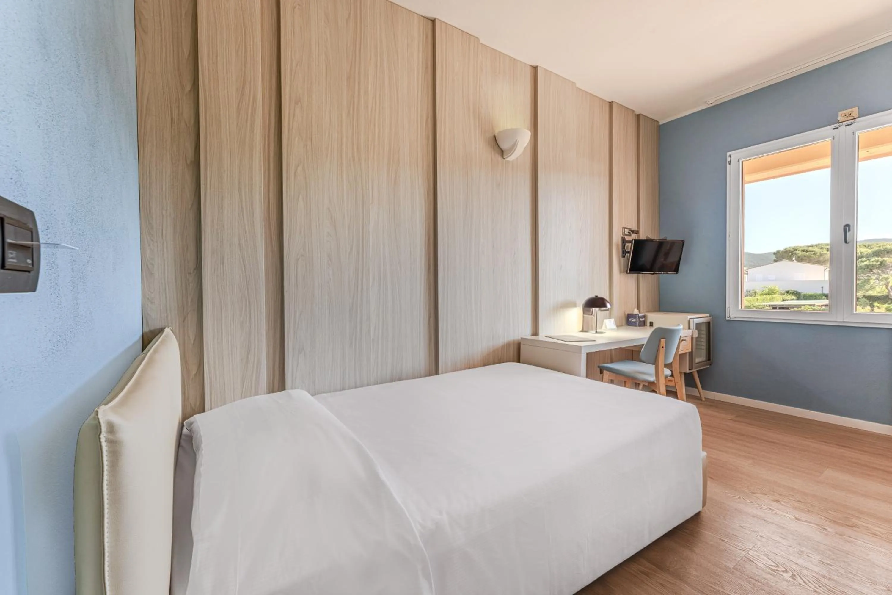 Bed in Hotel Riva del Sole