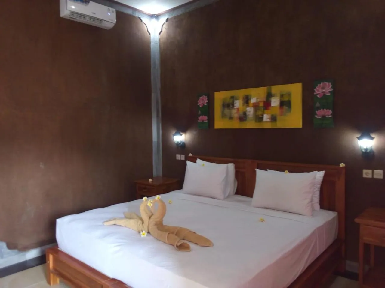 Bed in Eliska Sari Bungalows Sumberkima