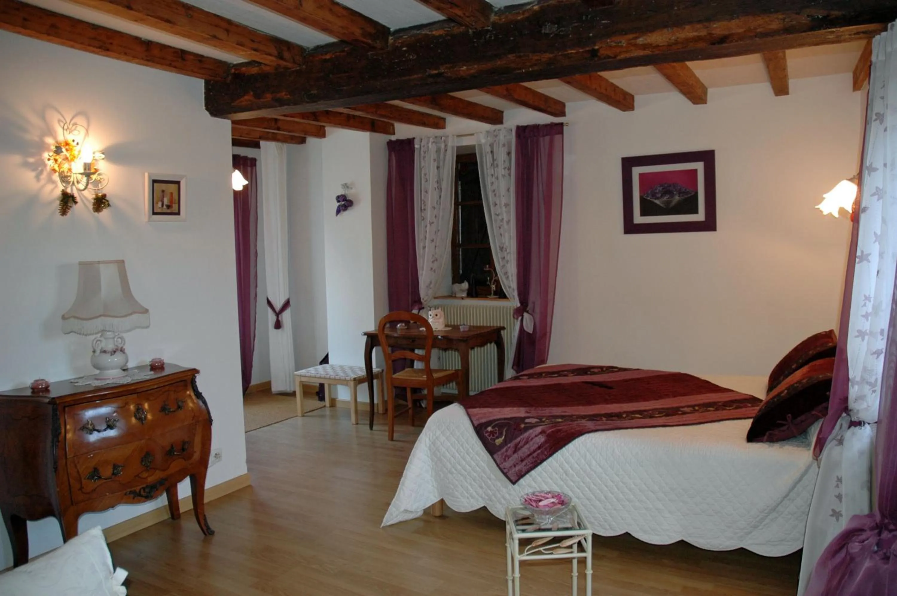 Bed in Chambres d'hôtes La Hulotte 69