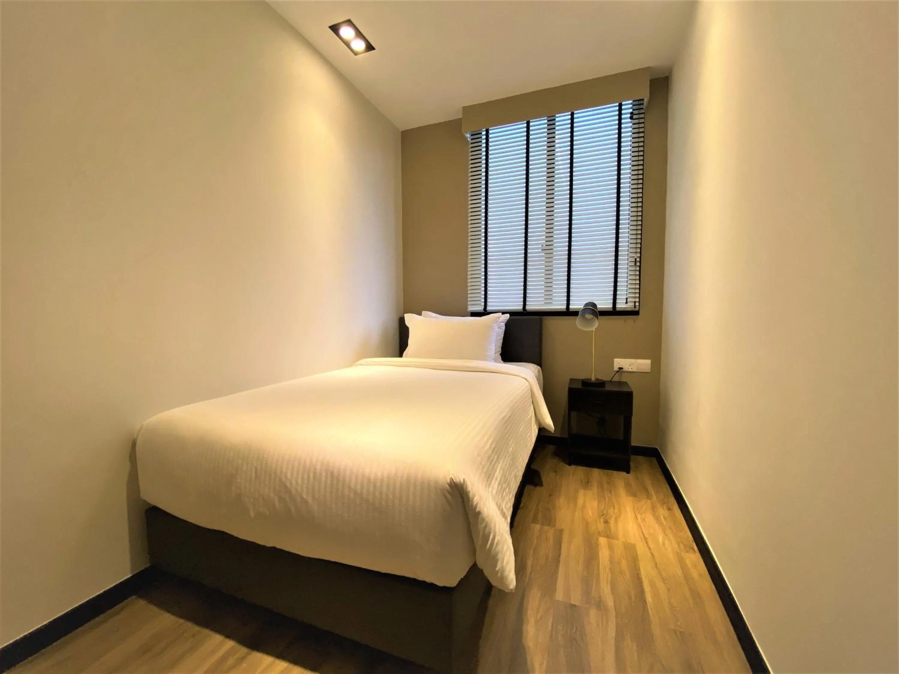 Bedroom in Momentus Serviced Residences Novena