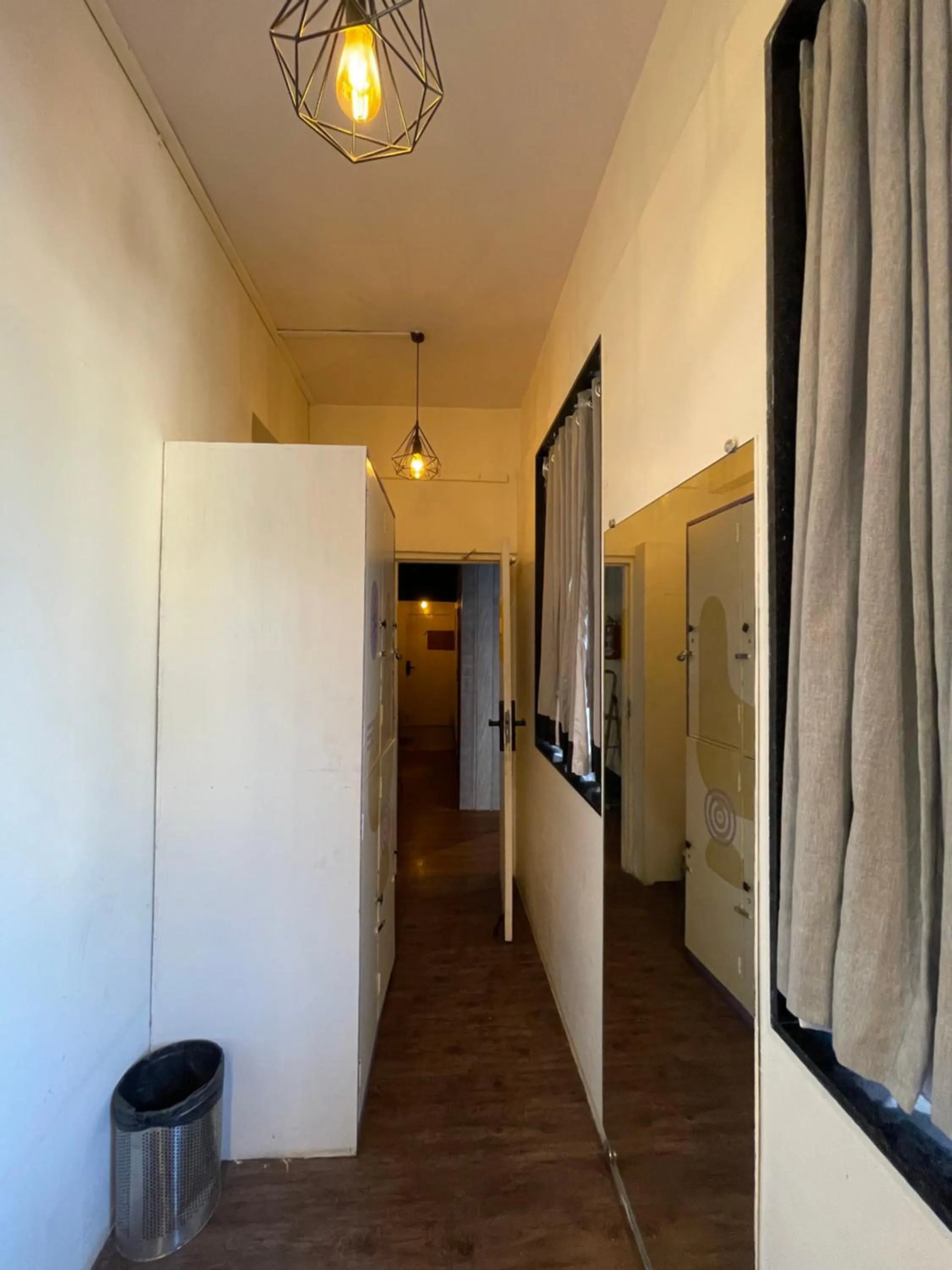 wardrobe in Locomo Hostel OG - Stay Work Eat