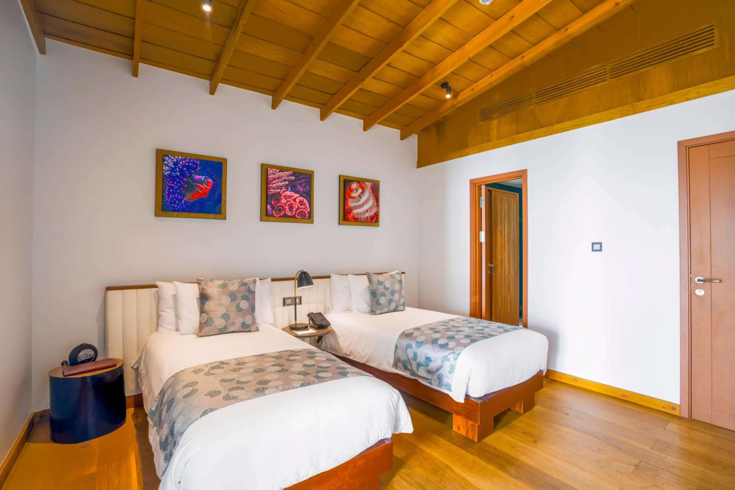 Bed in Emerald Faarufushi Resort & Spa - Deluxe All Inclusive