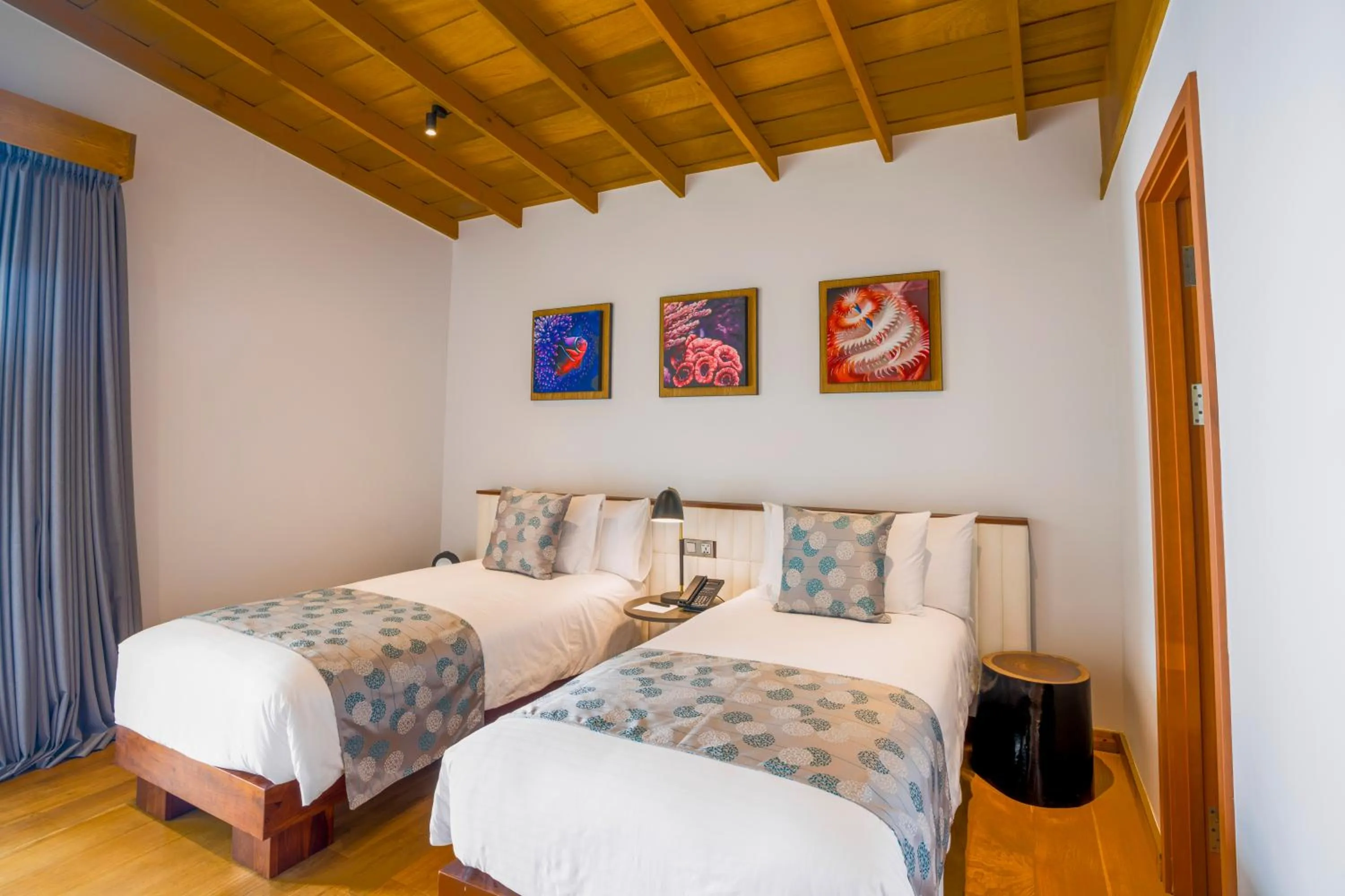 Bed in Emerald Faarufushi Resort & Spa - Deluxe All Inclusive