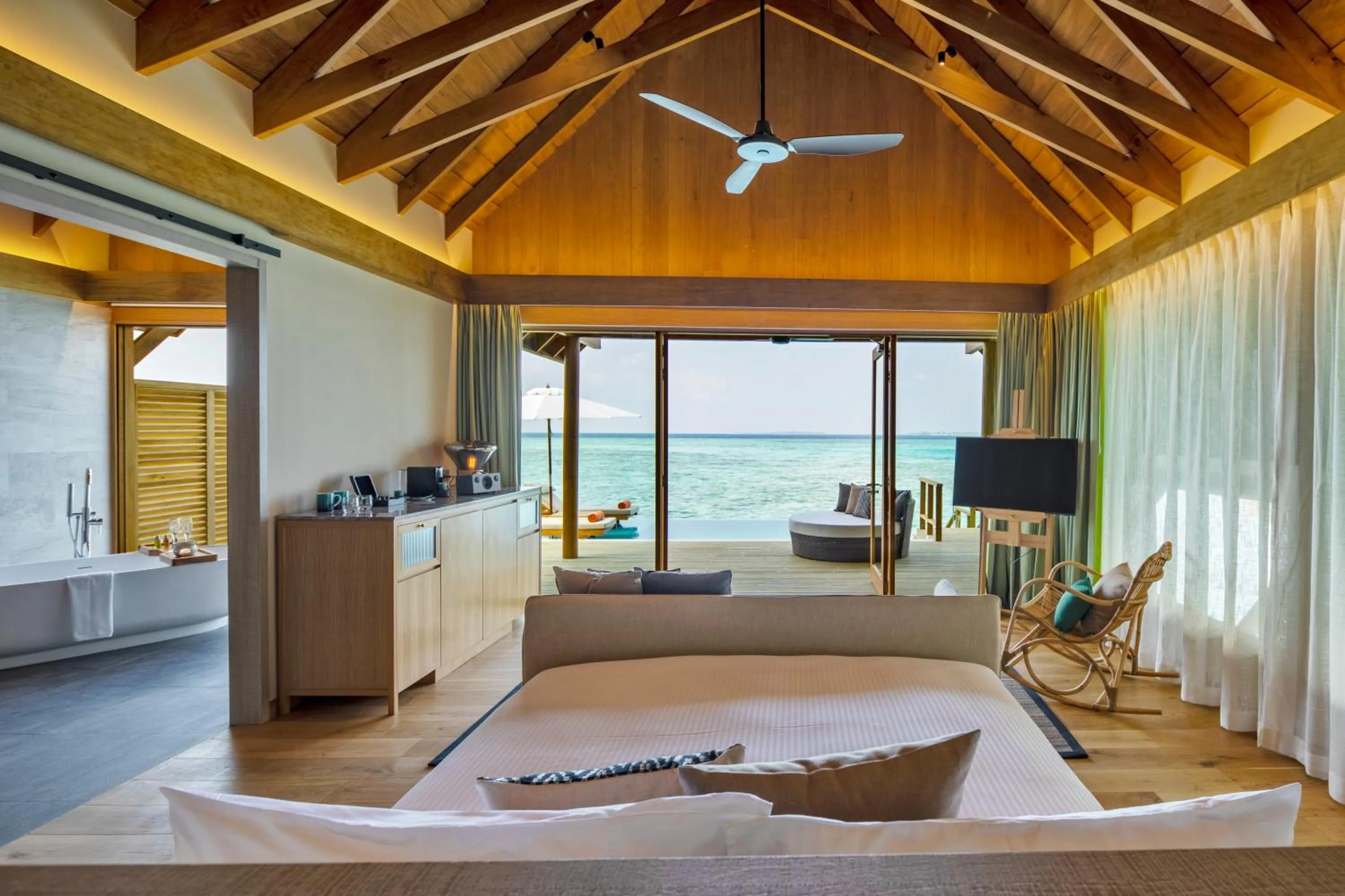 Bed in Emerald Faarufushi Resort & Spa - Deluxe All Inclusive