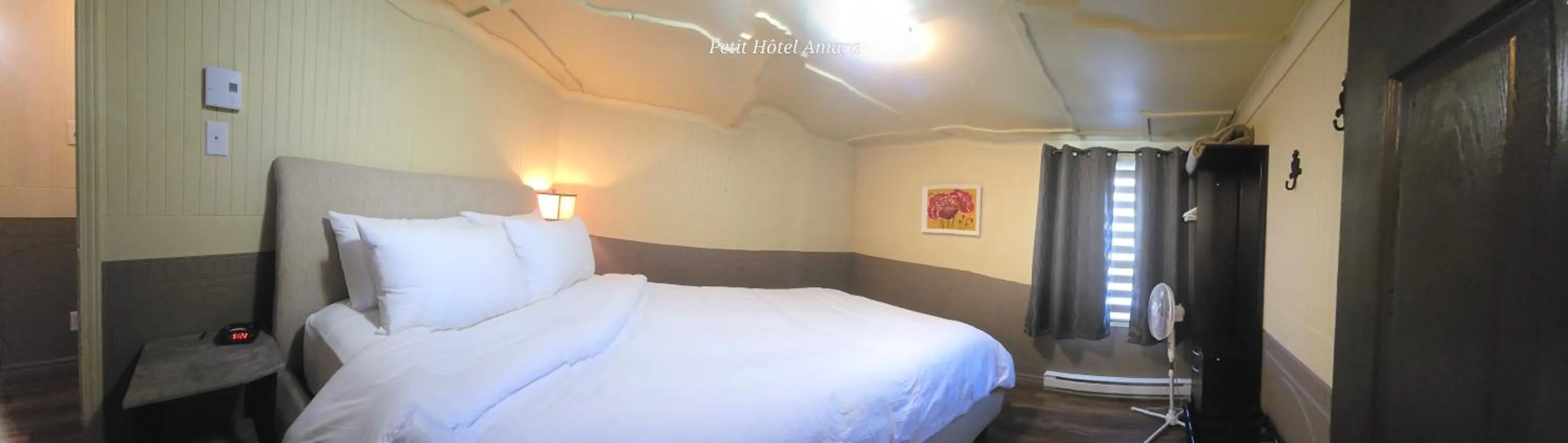 Bed in Petit Hôtel Amara