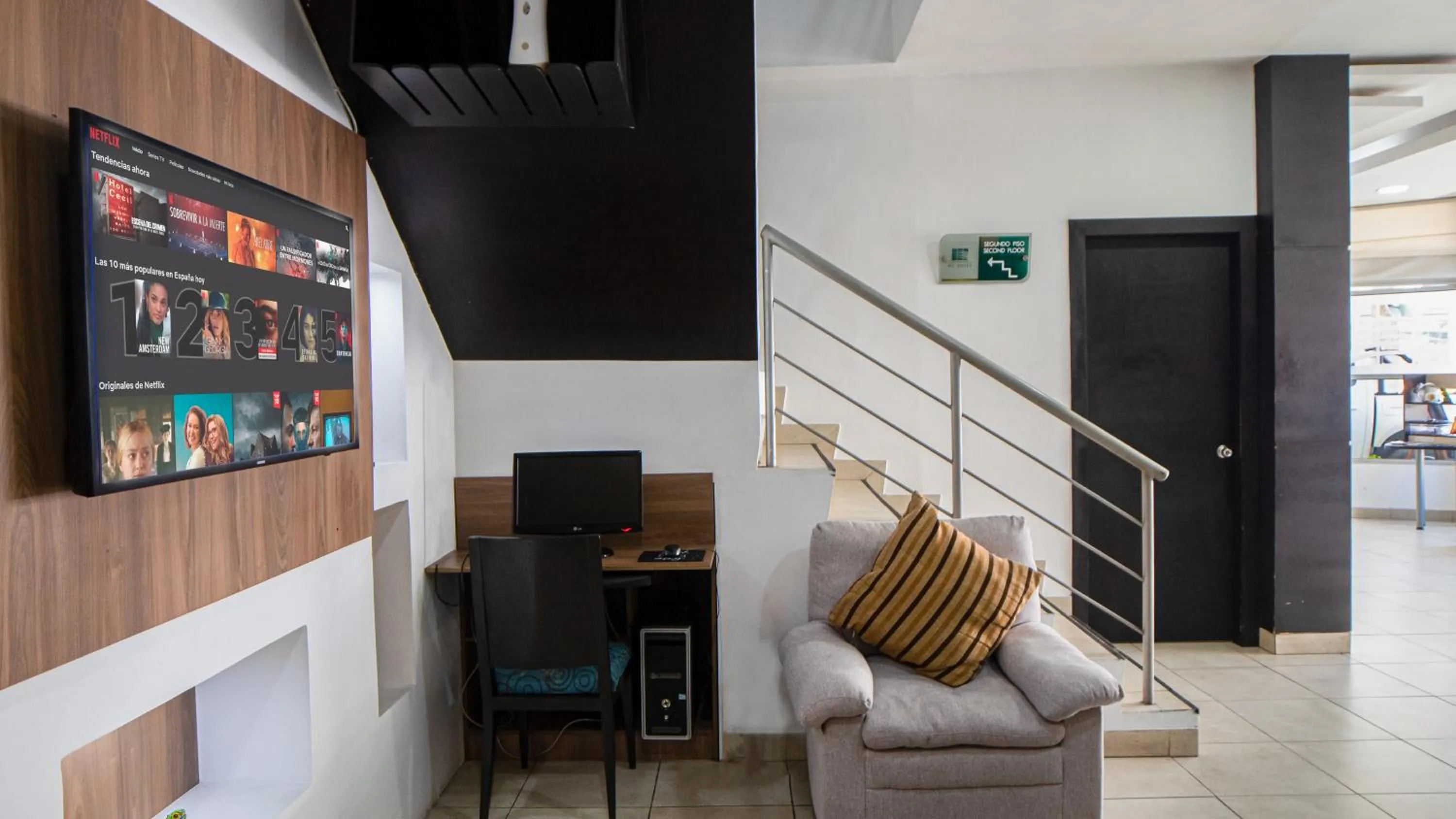 Living room in Hotel MC Suites - Confort cerca del Aeropuerto