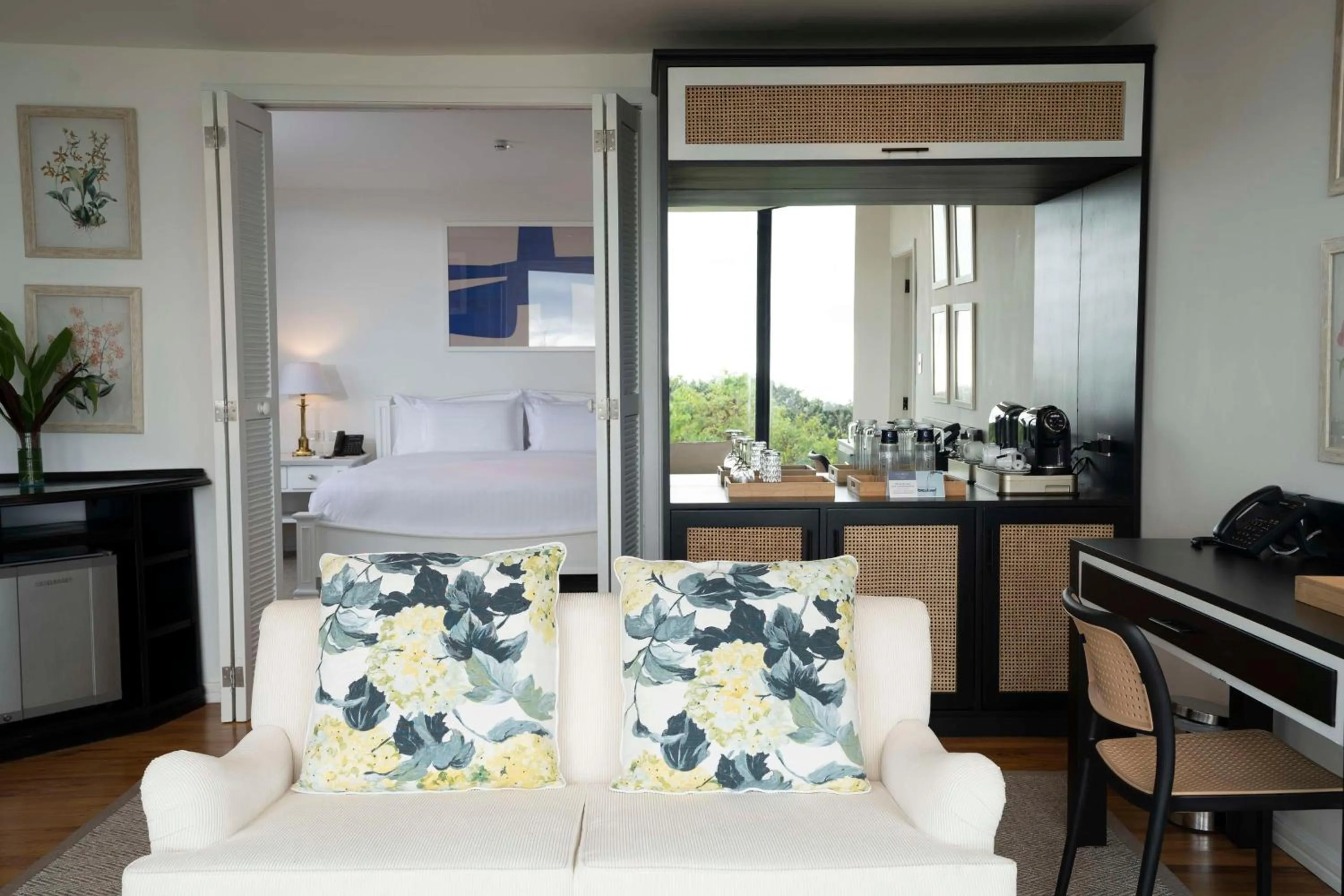 Living room, Bed in Royal Palm Galapagos, Curio Collection Hotel by Hilton