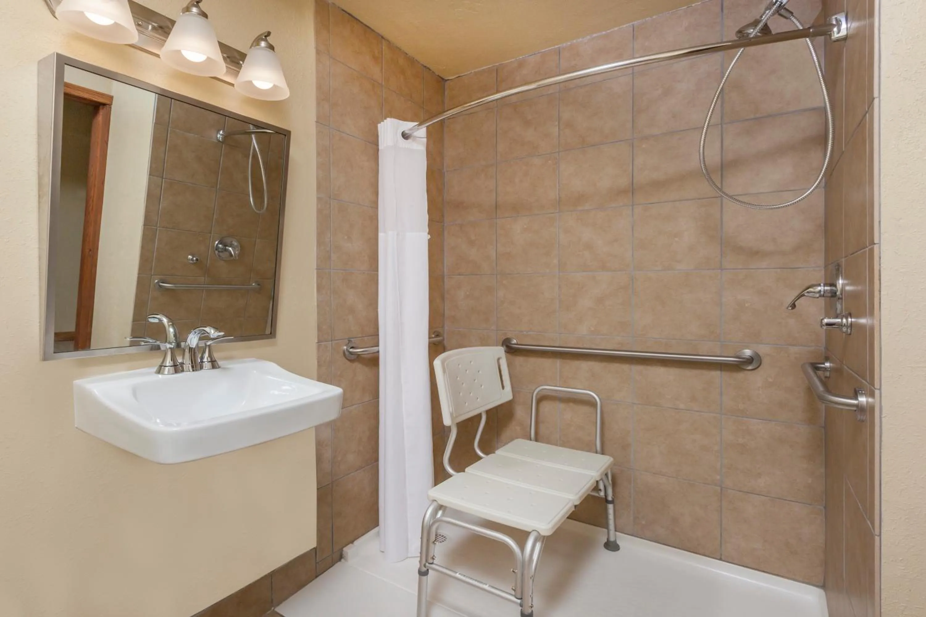 Shower in Baymont by Wyndham Midland