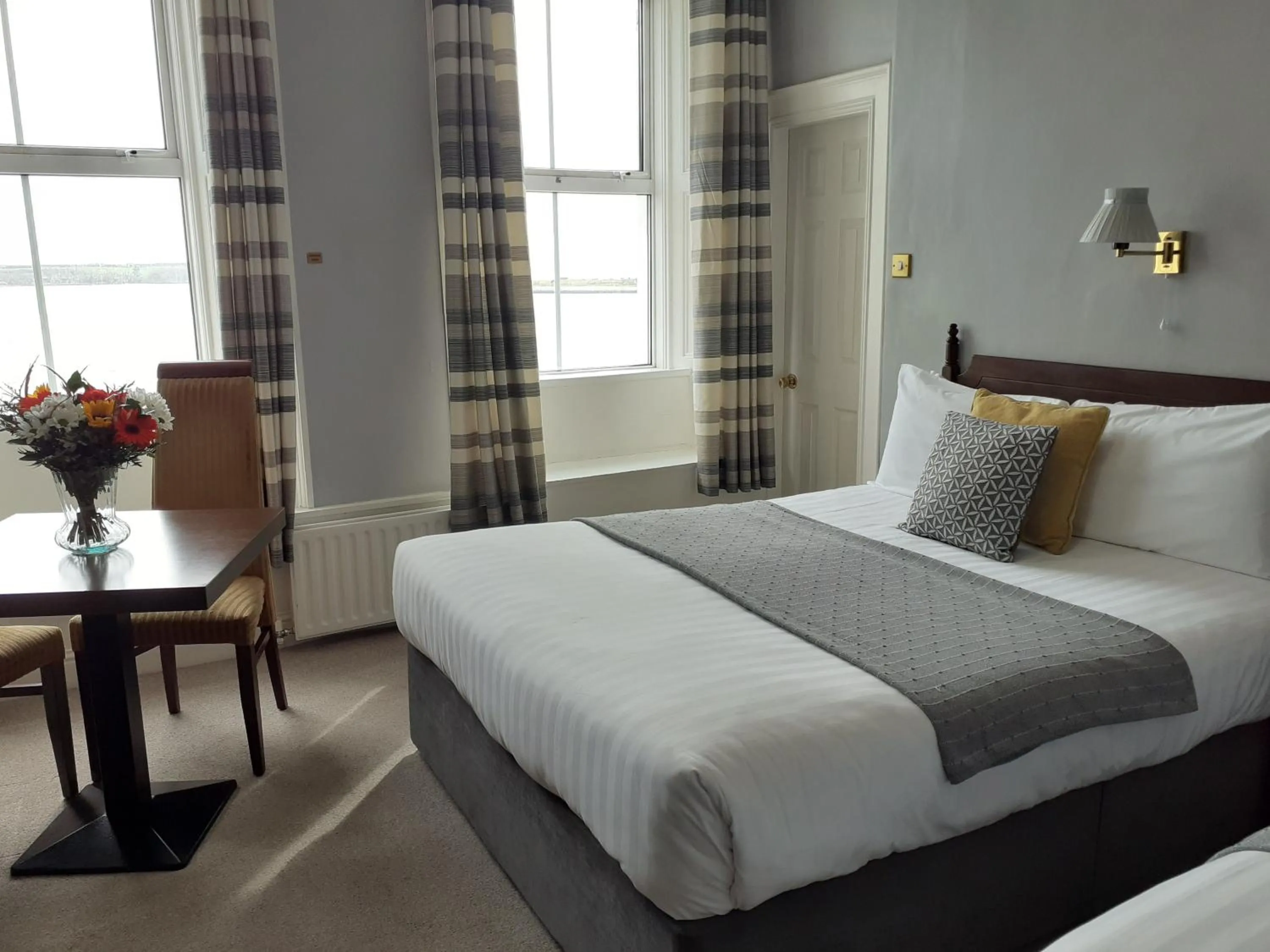 Bed in Commodore Hotel