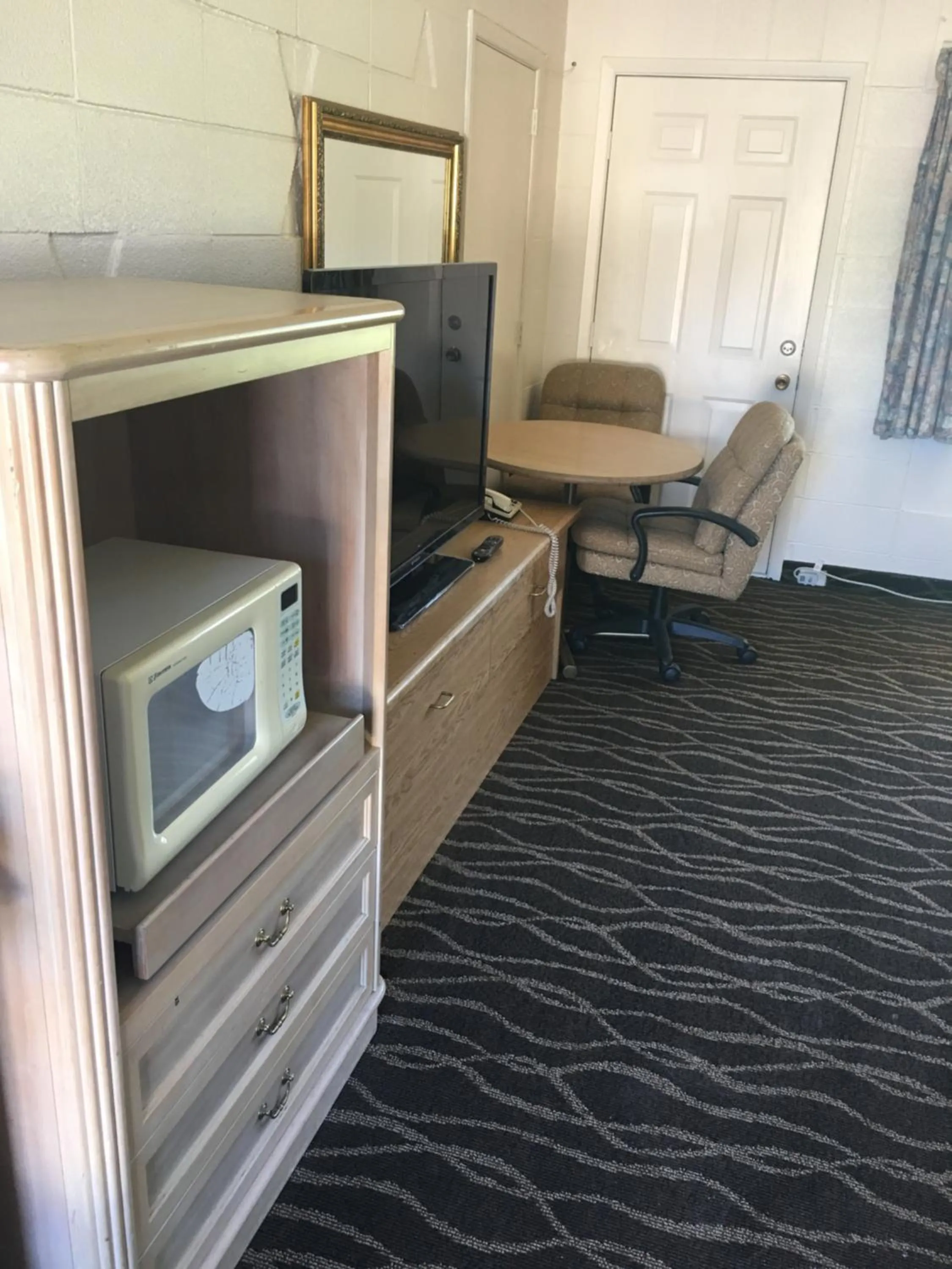 Bedroom in Budget Inn Motel