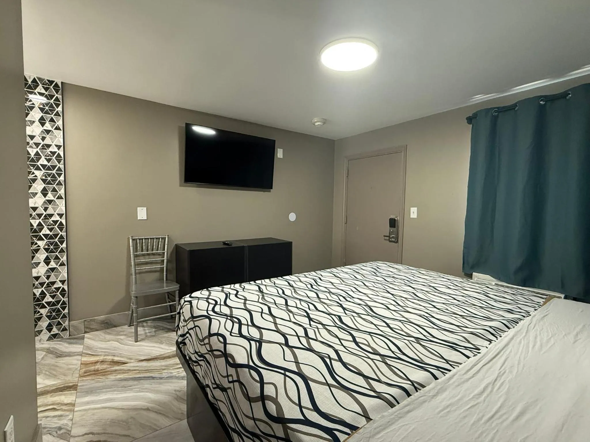 Bed in Beauty Rest Hotel