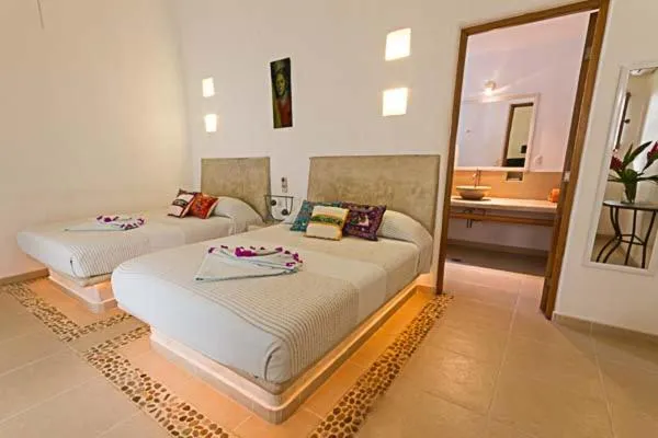 Bathroom, Bed in Villas Naomi