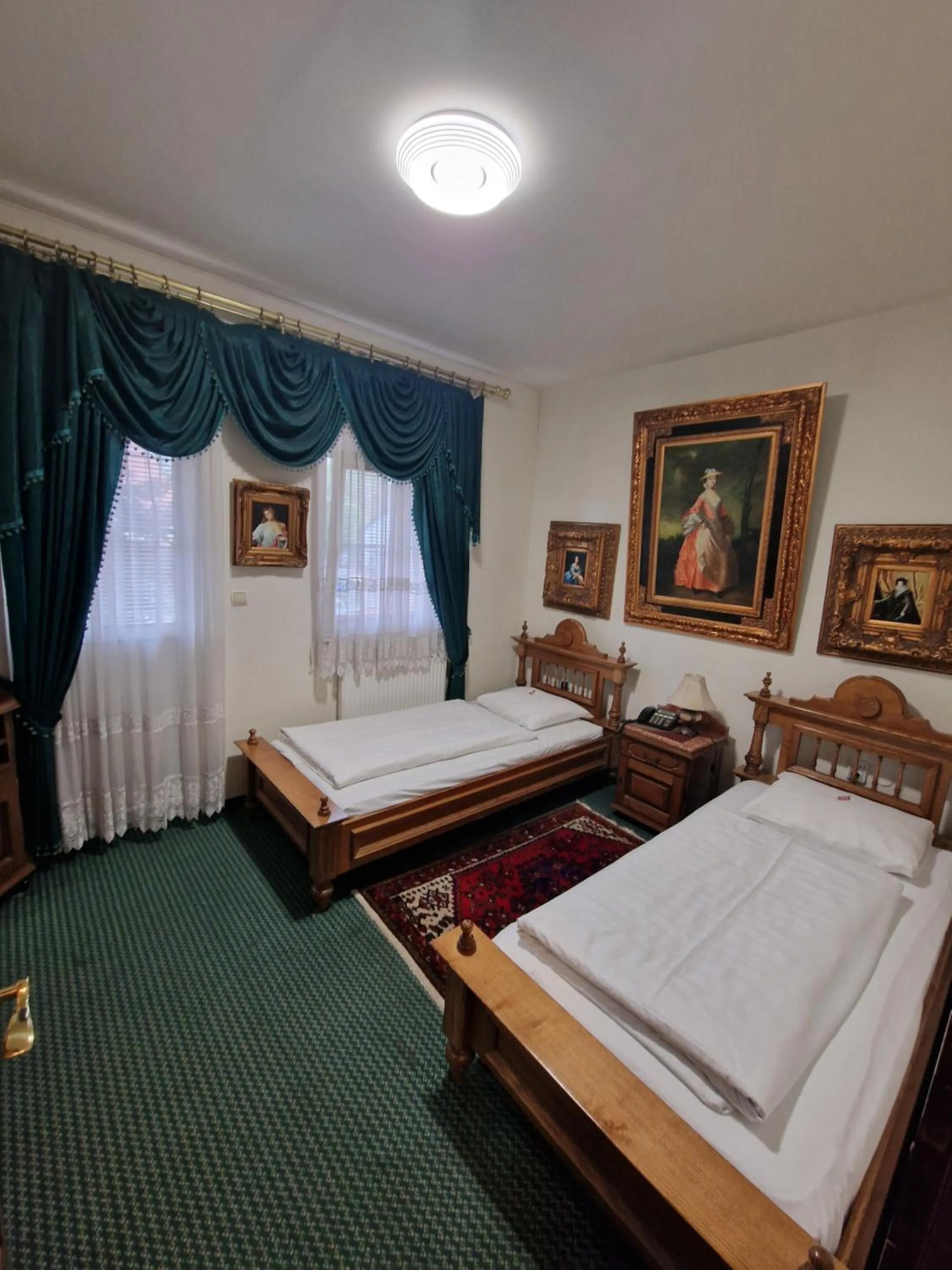 Twin Room with Balcony - single occupancy in Hotel Razgorsek