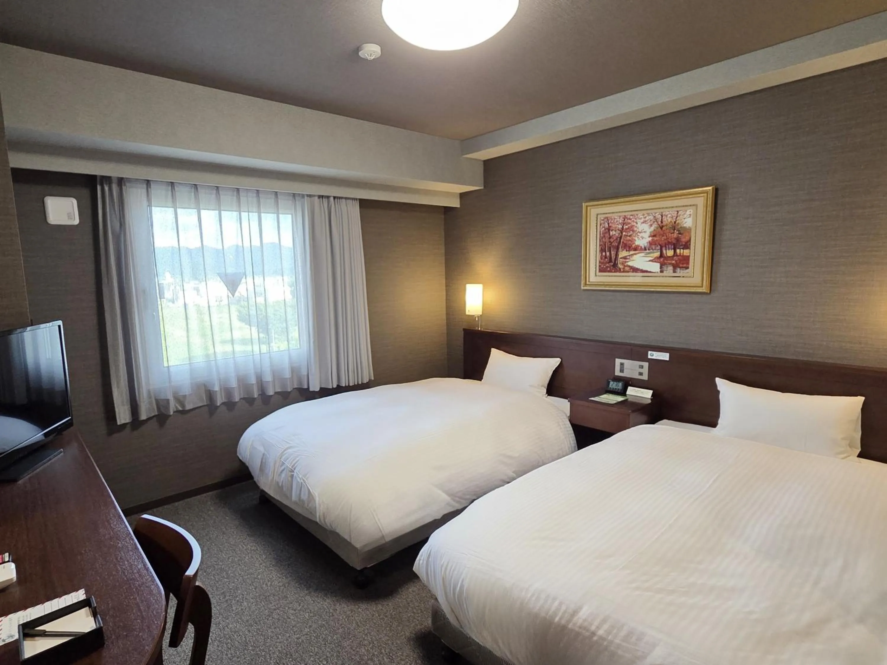 Photo of the whole room, Bed in Hotel Route-Inn Odate Eki Minami