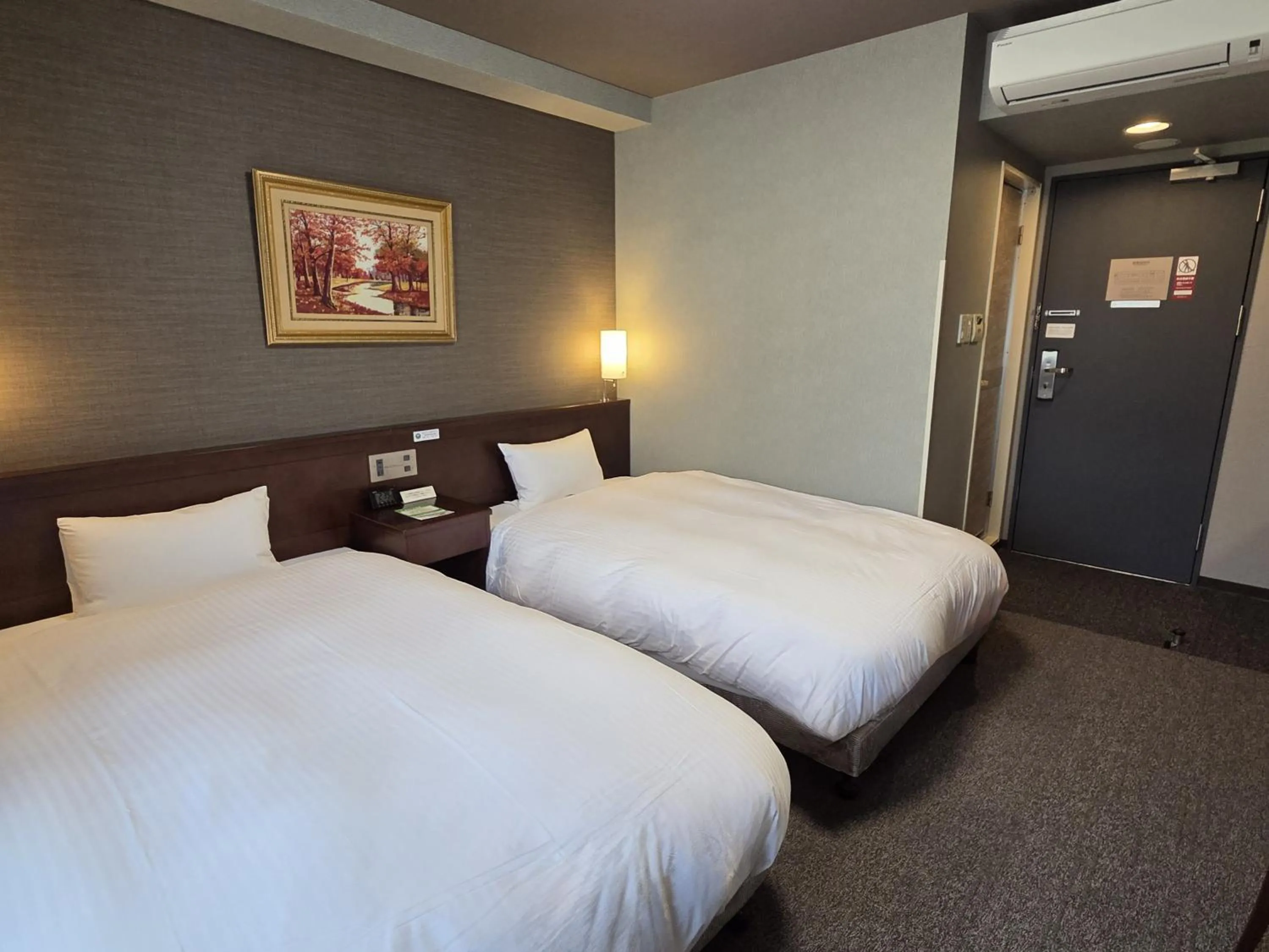 Photo of the whole room, Bed in Hotel Route-Inn Odate Eki Minami