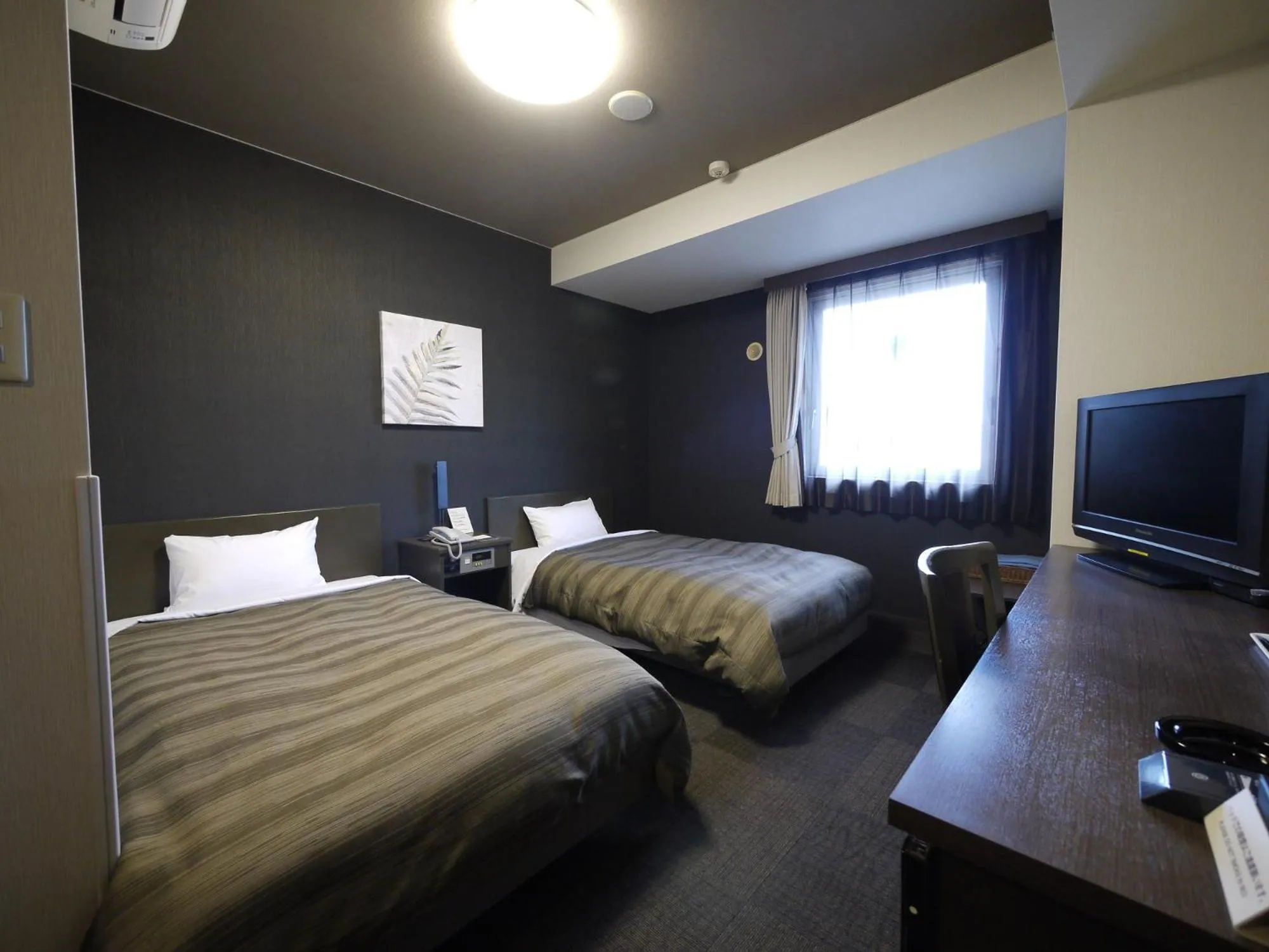 Photo of the whole room, Bed in Hotel Route-Inn Susono Inter