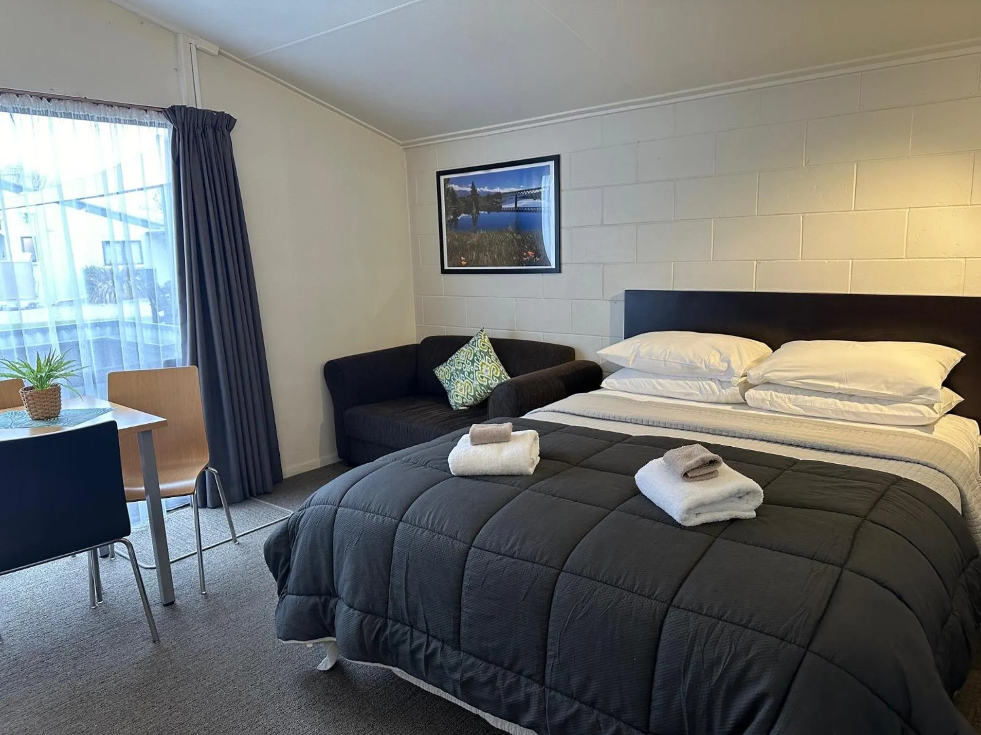 Bed in Anderson Park Motel