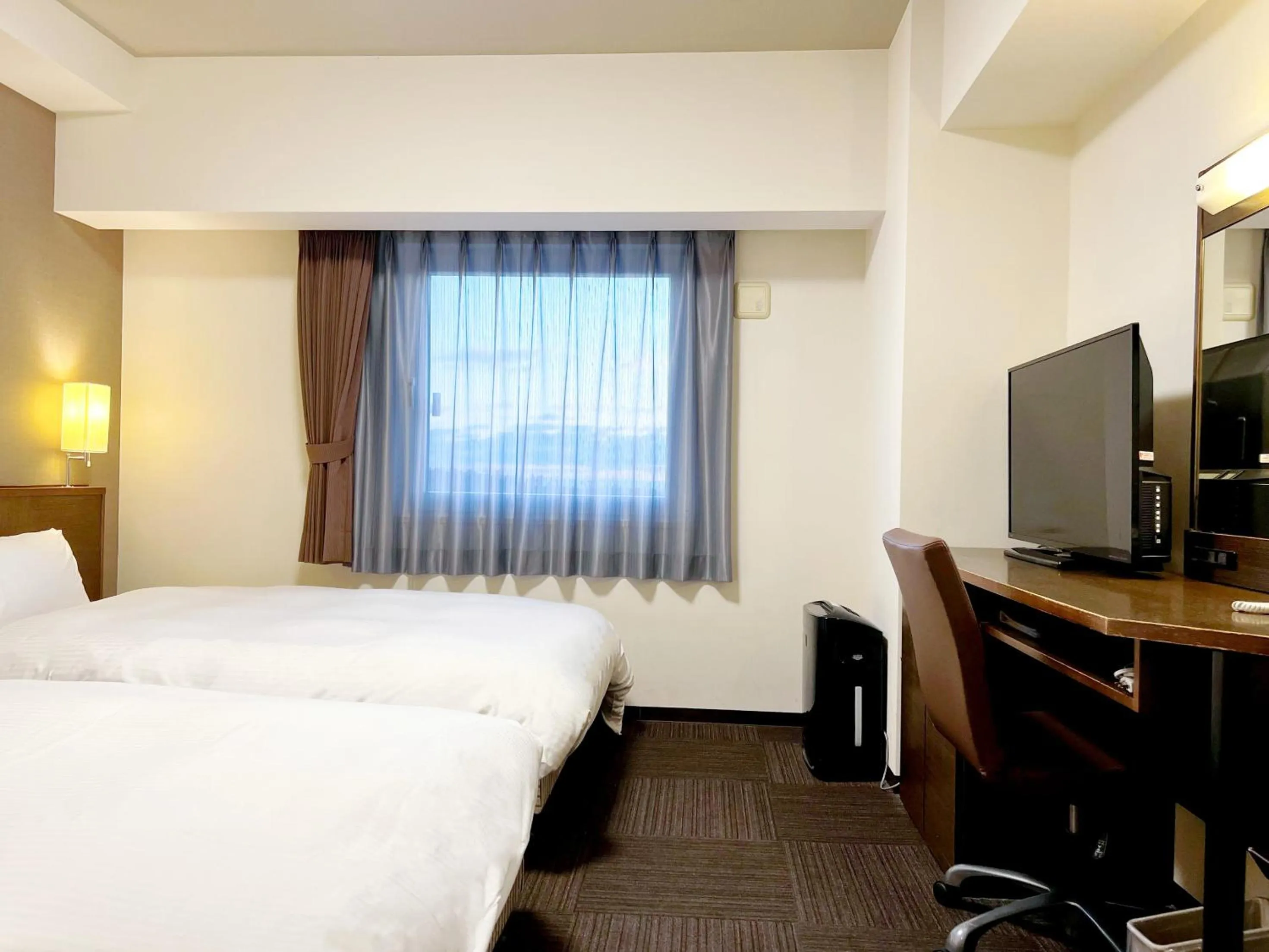 Photo of the whole room, Bed in Hotel Route-Inn Yurihonjo