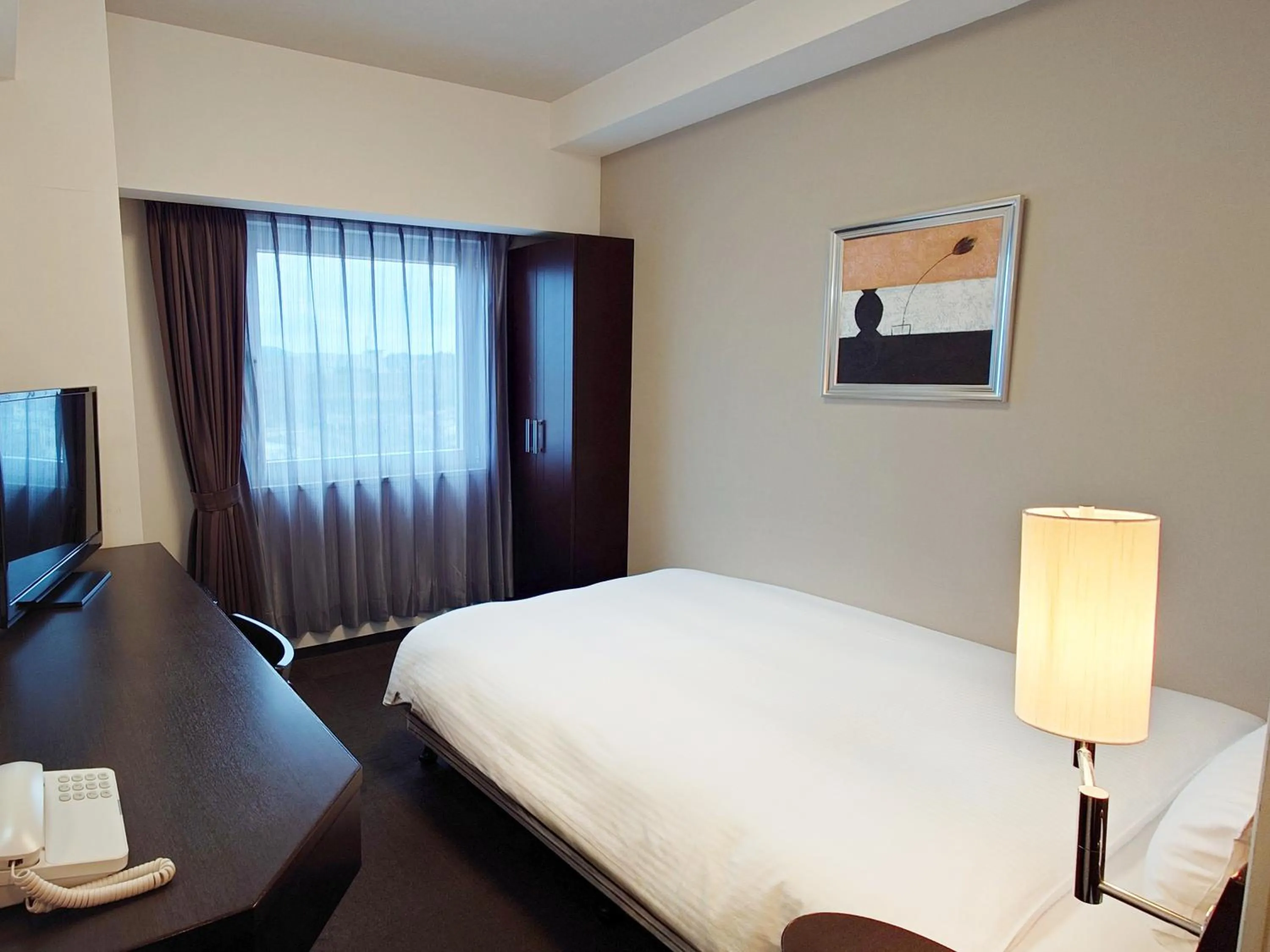 Photo of the whole room, Bed in Hotel Route-Inn Yurihonjo