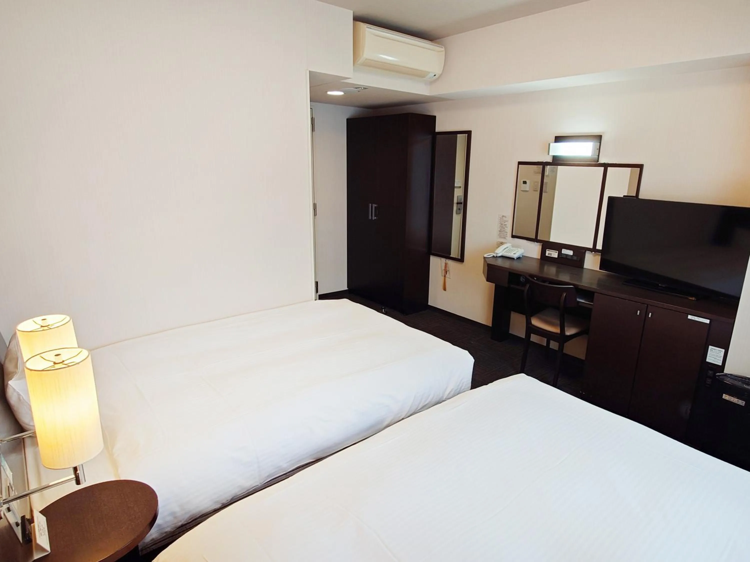 Photo of the whole room, Bed in Hotel Route-Inn Yurihonjo