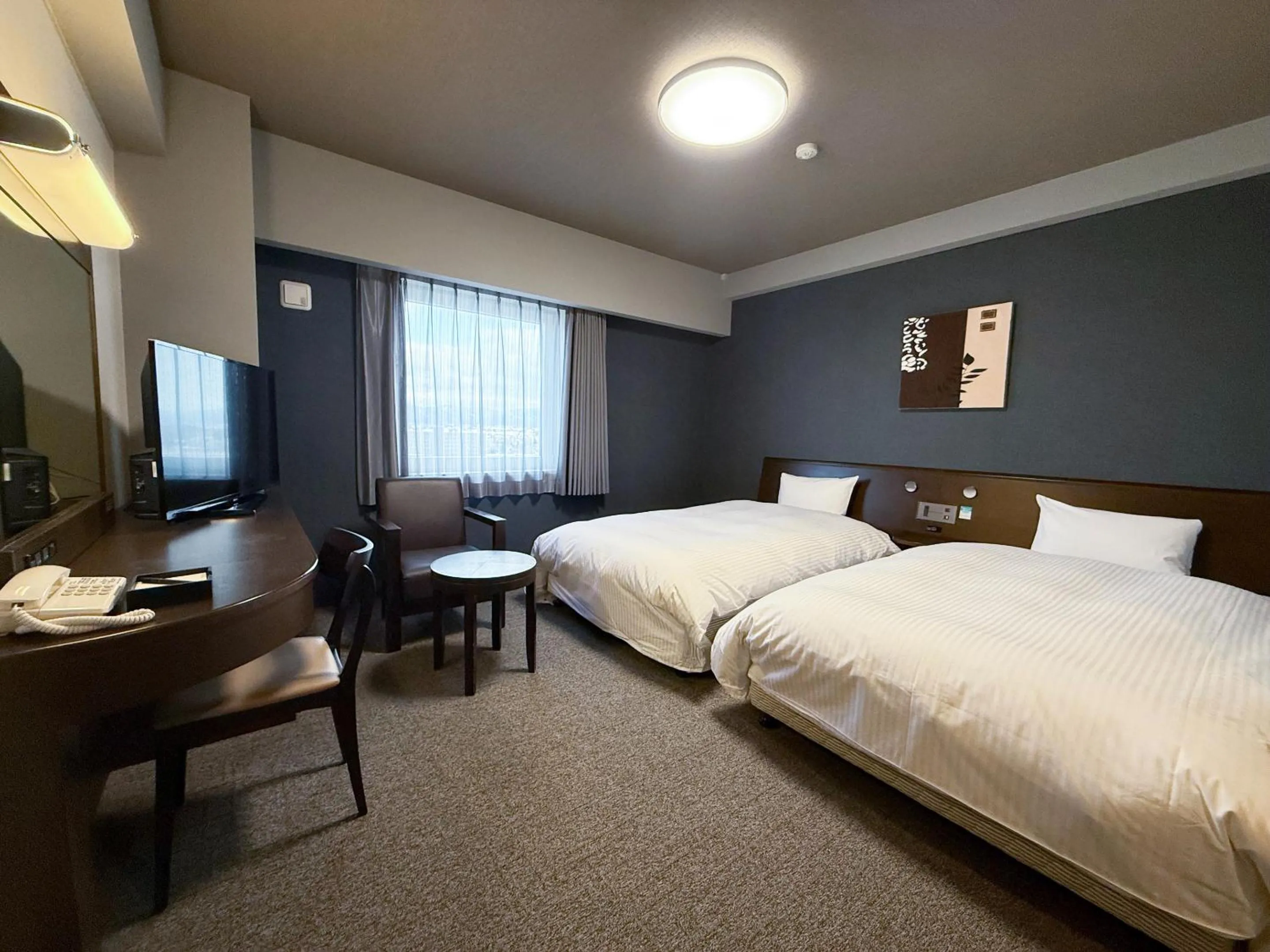 Photo of the whole room, Bed in Hotel Route-Inn Omagari Ekimae