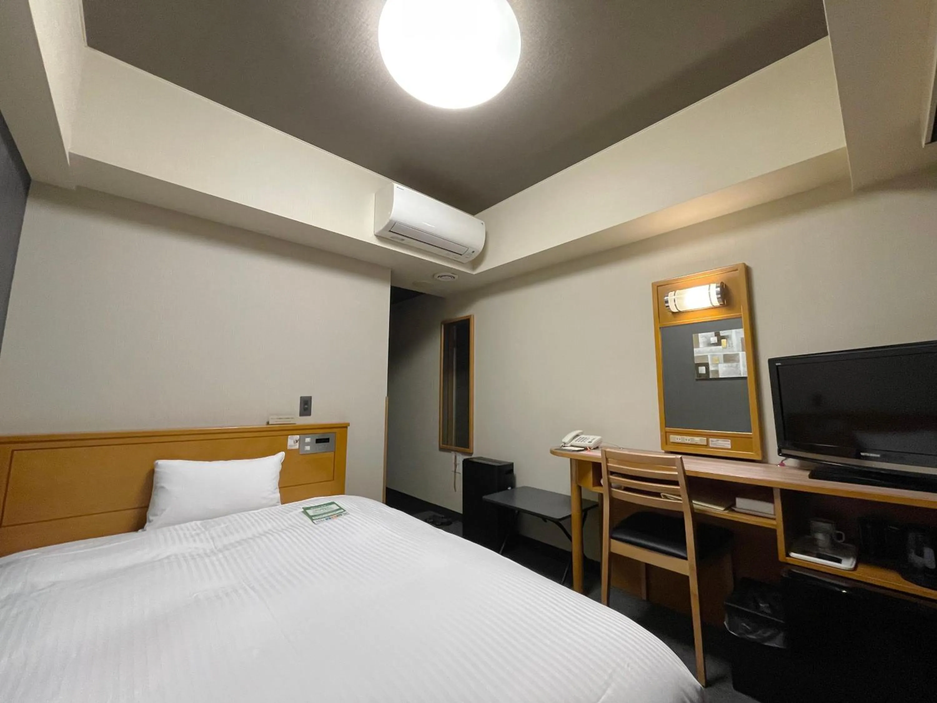 Photo of the whole room, Bed in Hotel Route-Inn Yokote Inter