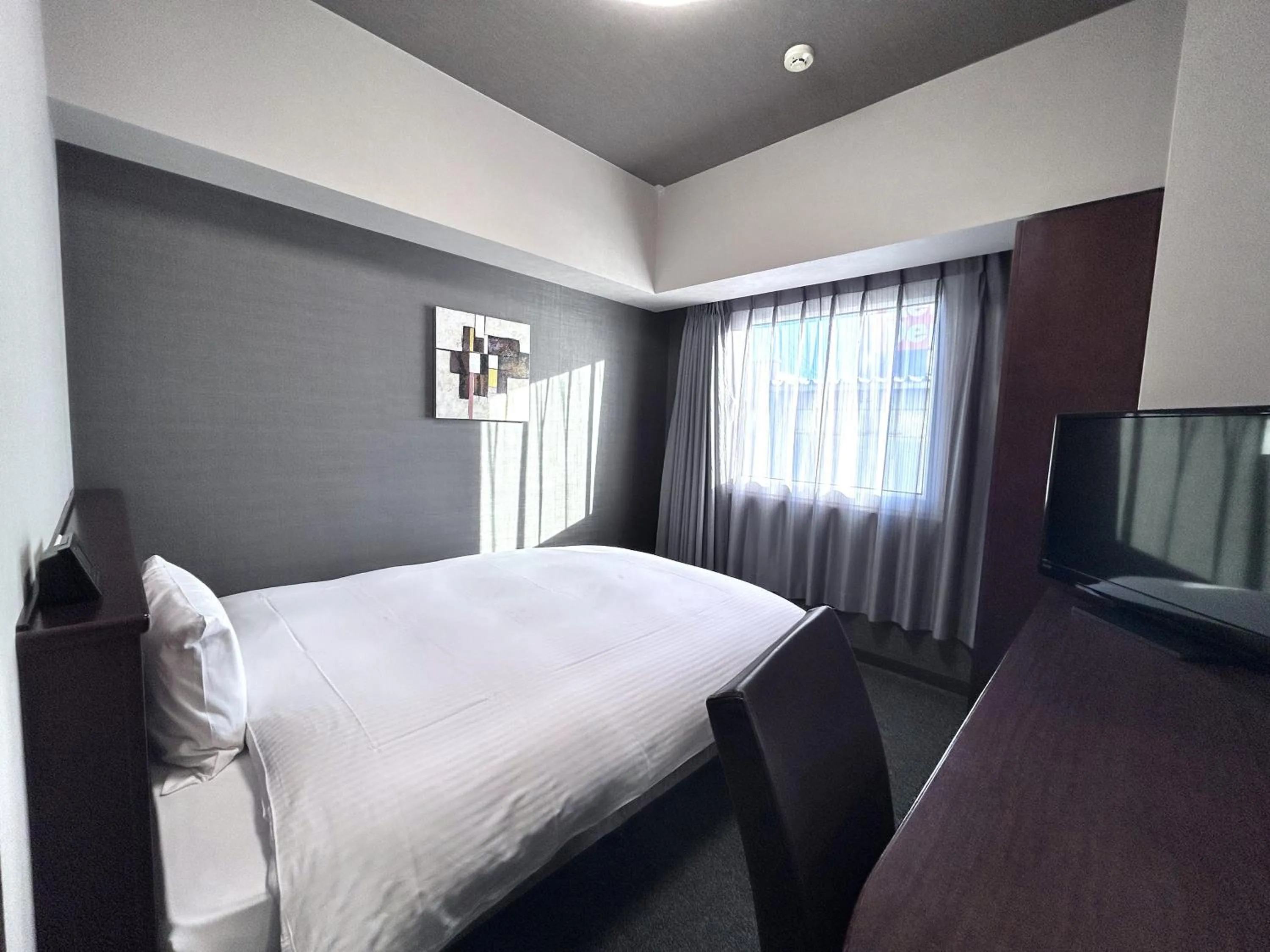 Photo of the whole room, Bed in Hotel Route-Inn Morioka Minami Inter