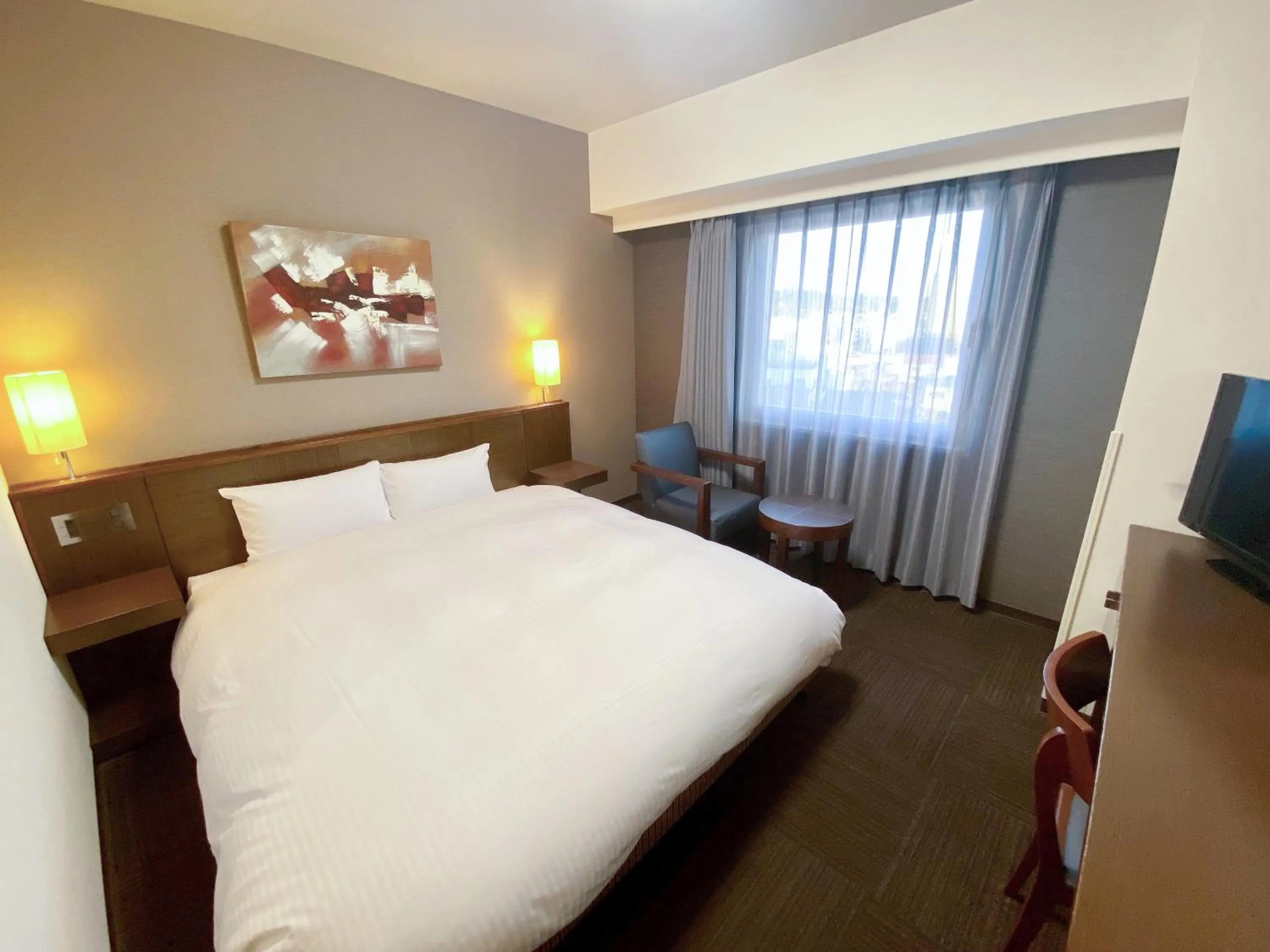 Photo of the whole room, Bed in Hotel Route-Inn Ashikaga Ekimae