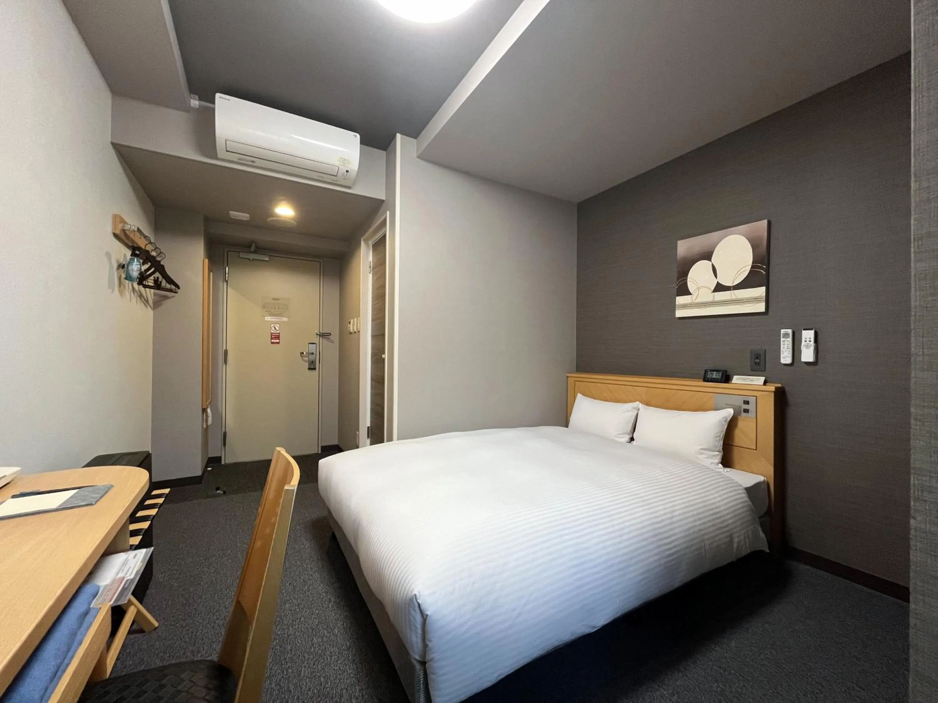 Photo of the whole room, Bed in Hotel Route-Inn Morioka Ekimae