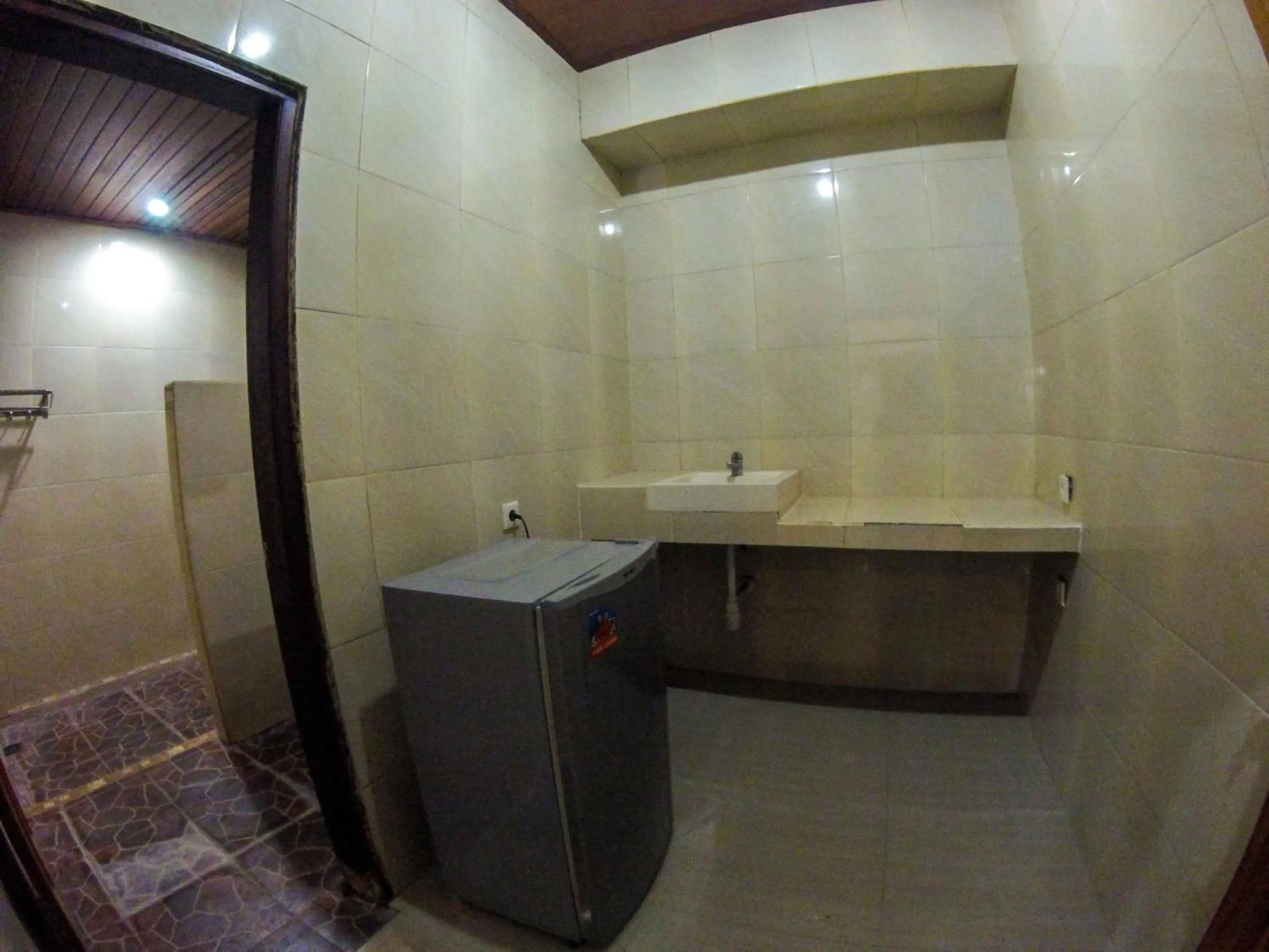 Area and facilities in Putu Guest House