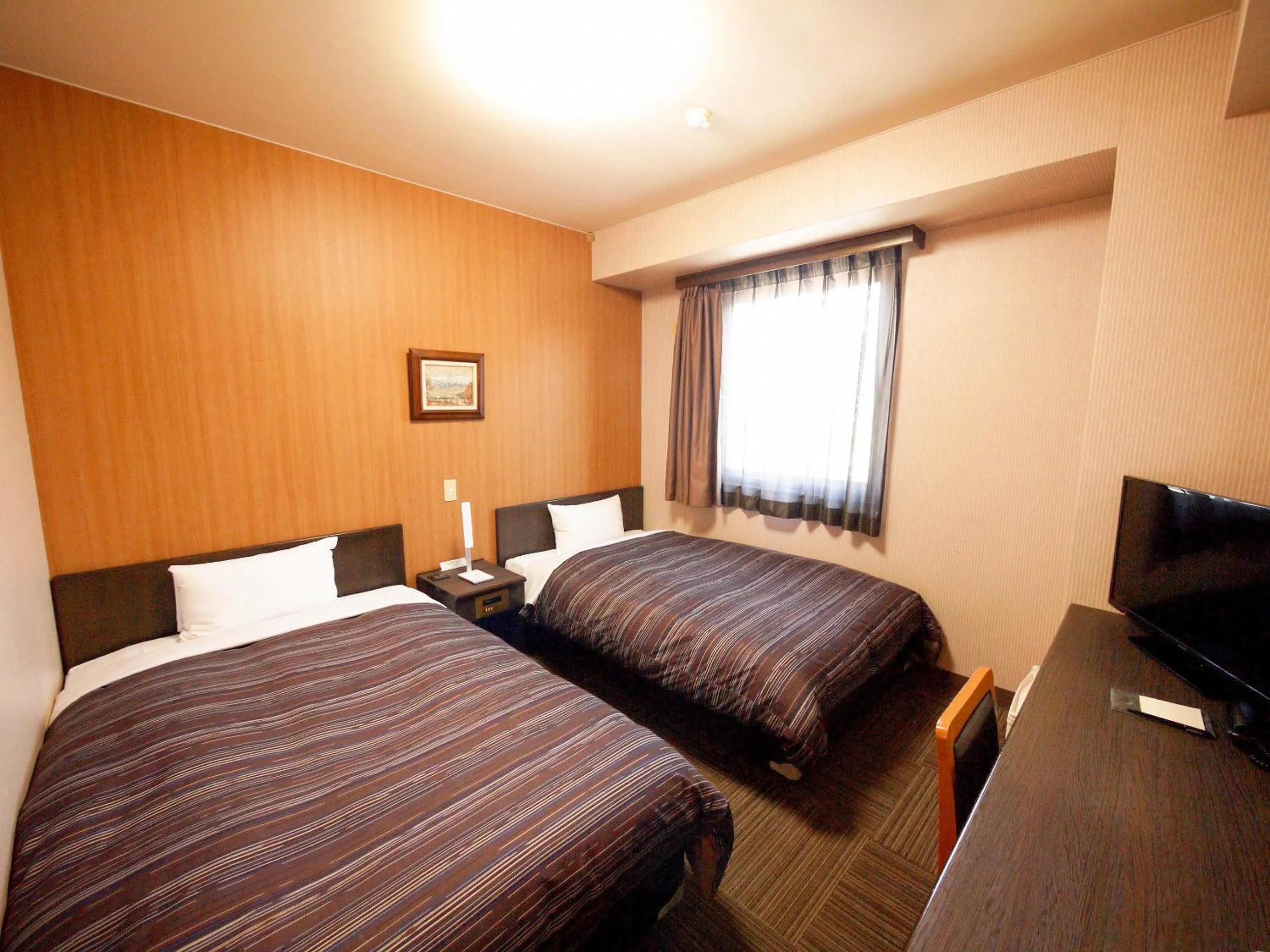 Photo of the whole room, Bed in Hotel Route-Inn Court Minami Matsumoto