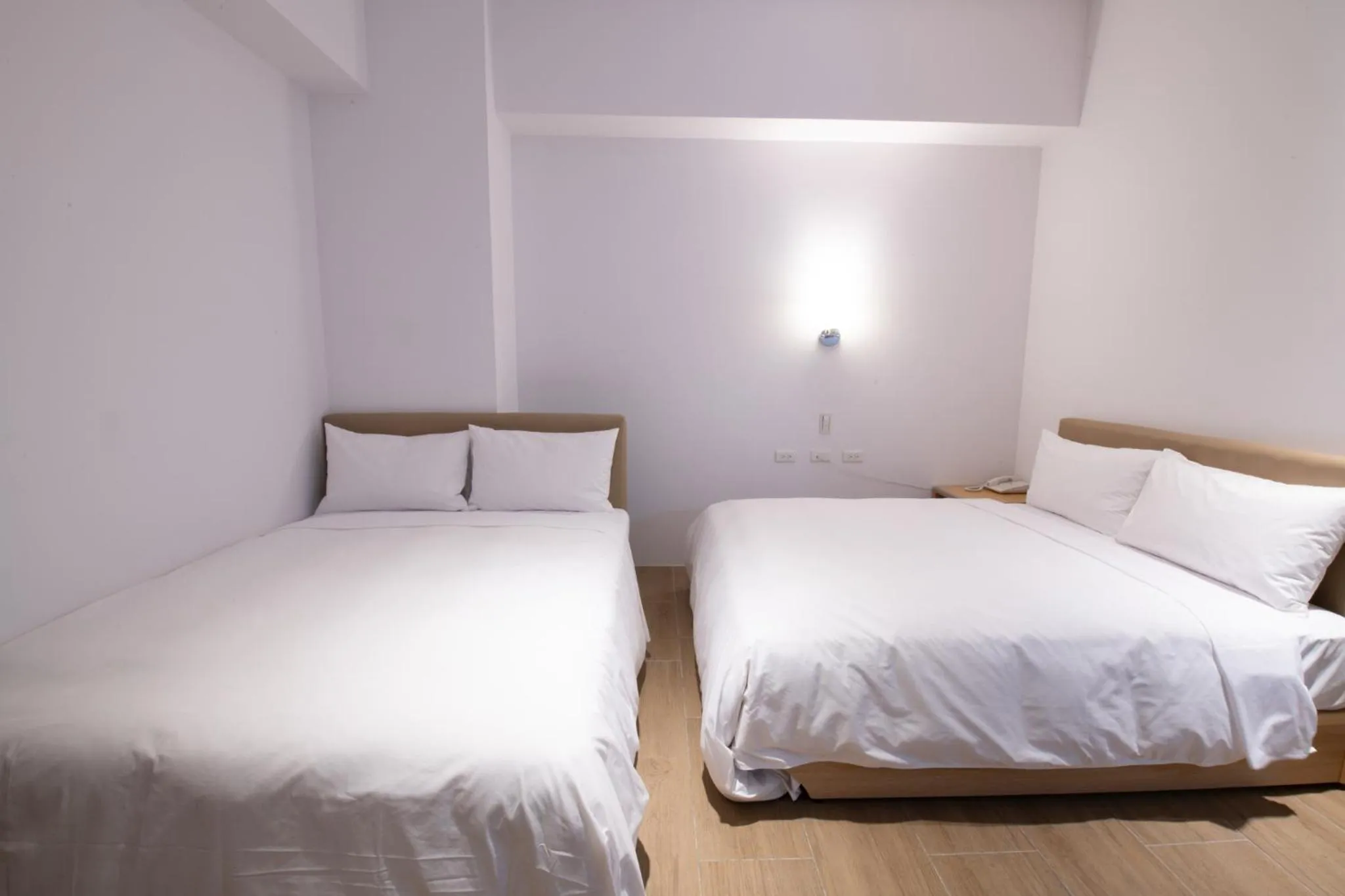 Bed in LIANN Hotel