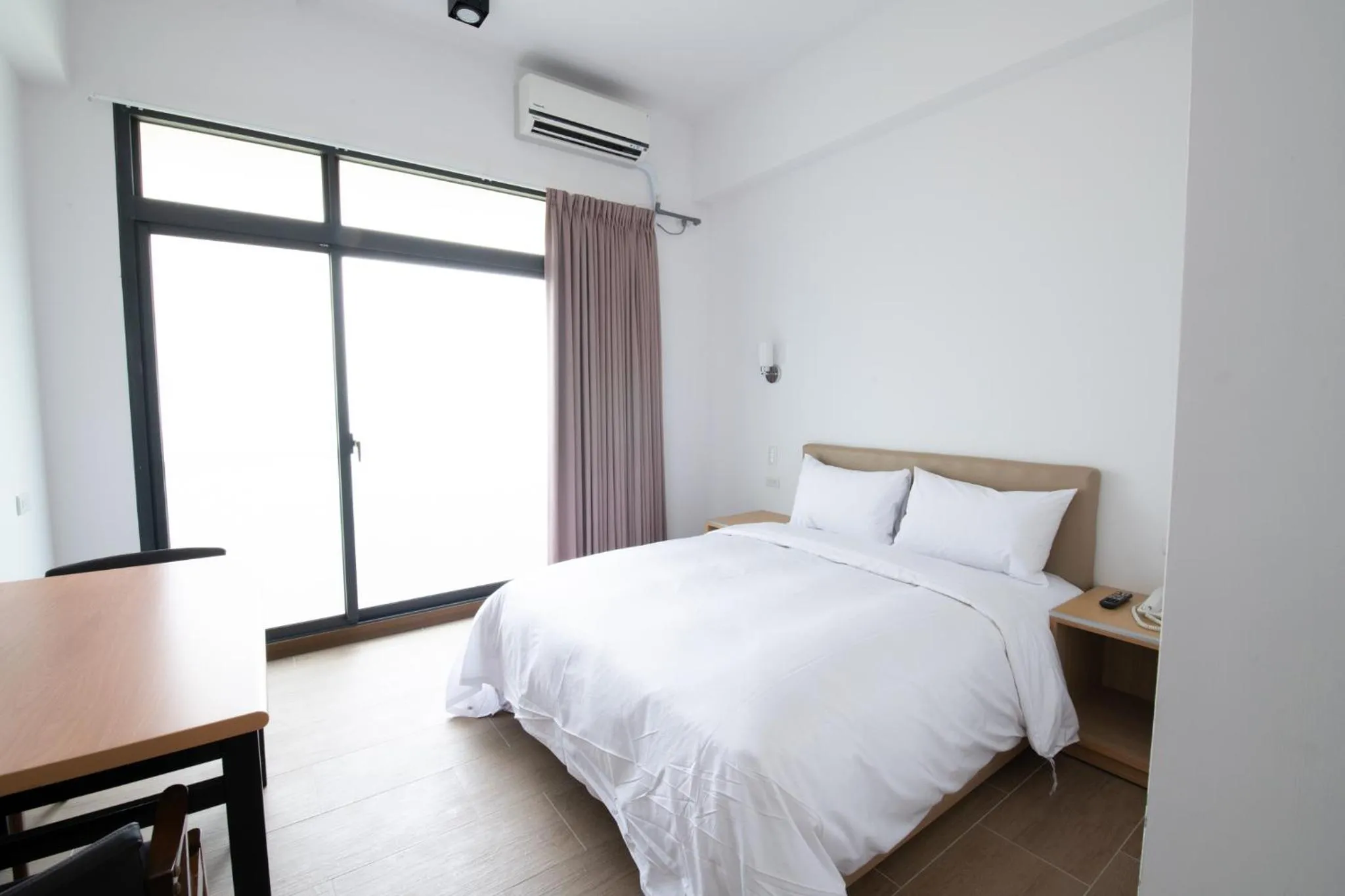 Photo of the whole room, Bed in LIANN Hotel