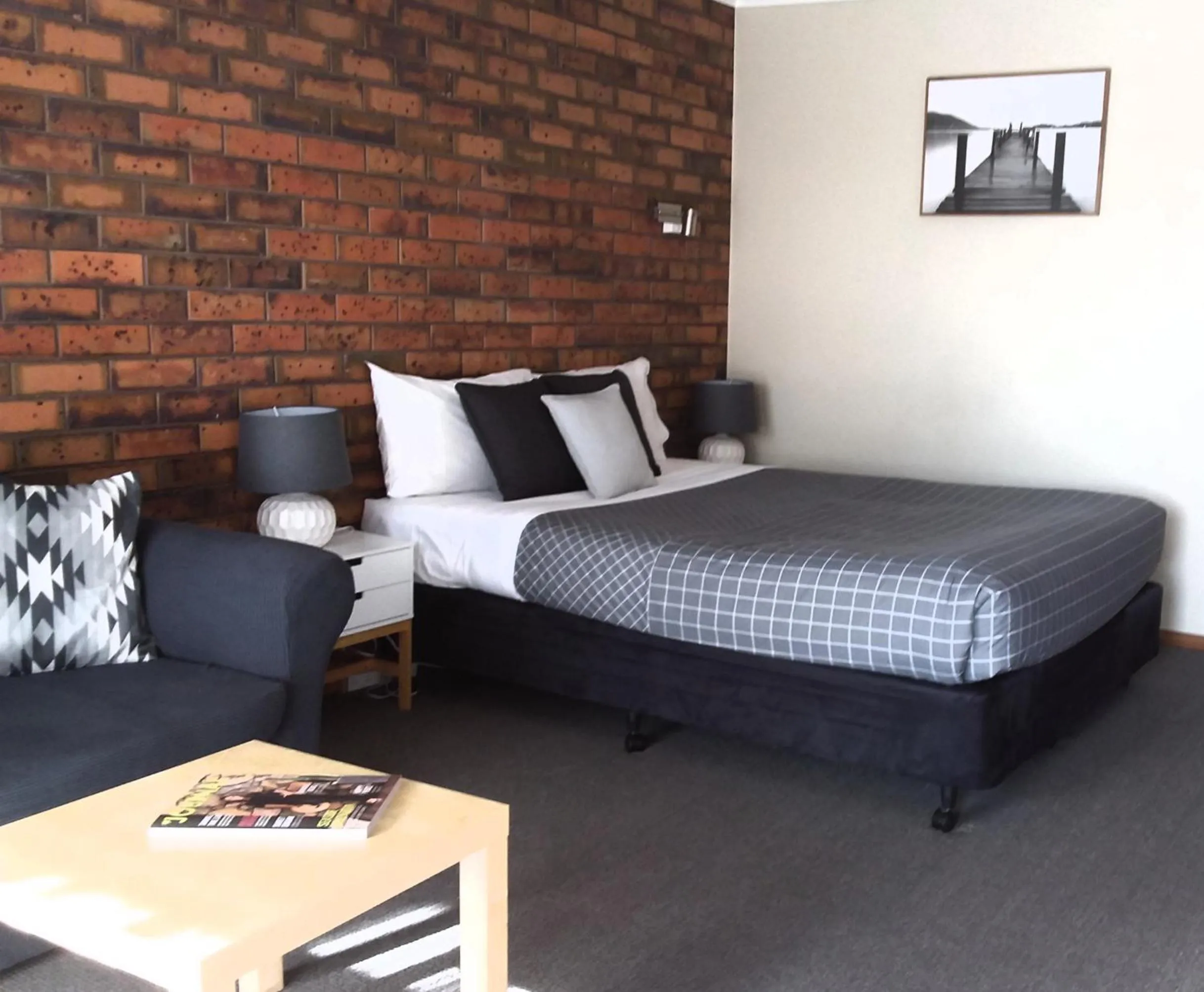 Bed in Golden Palms Motel