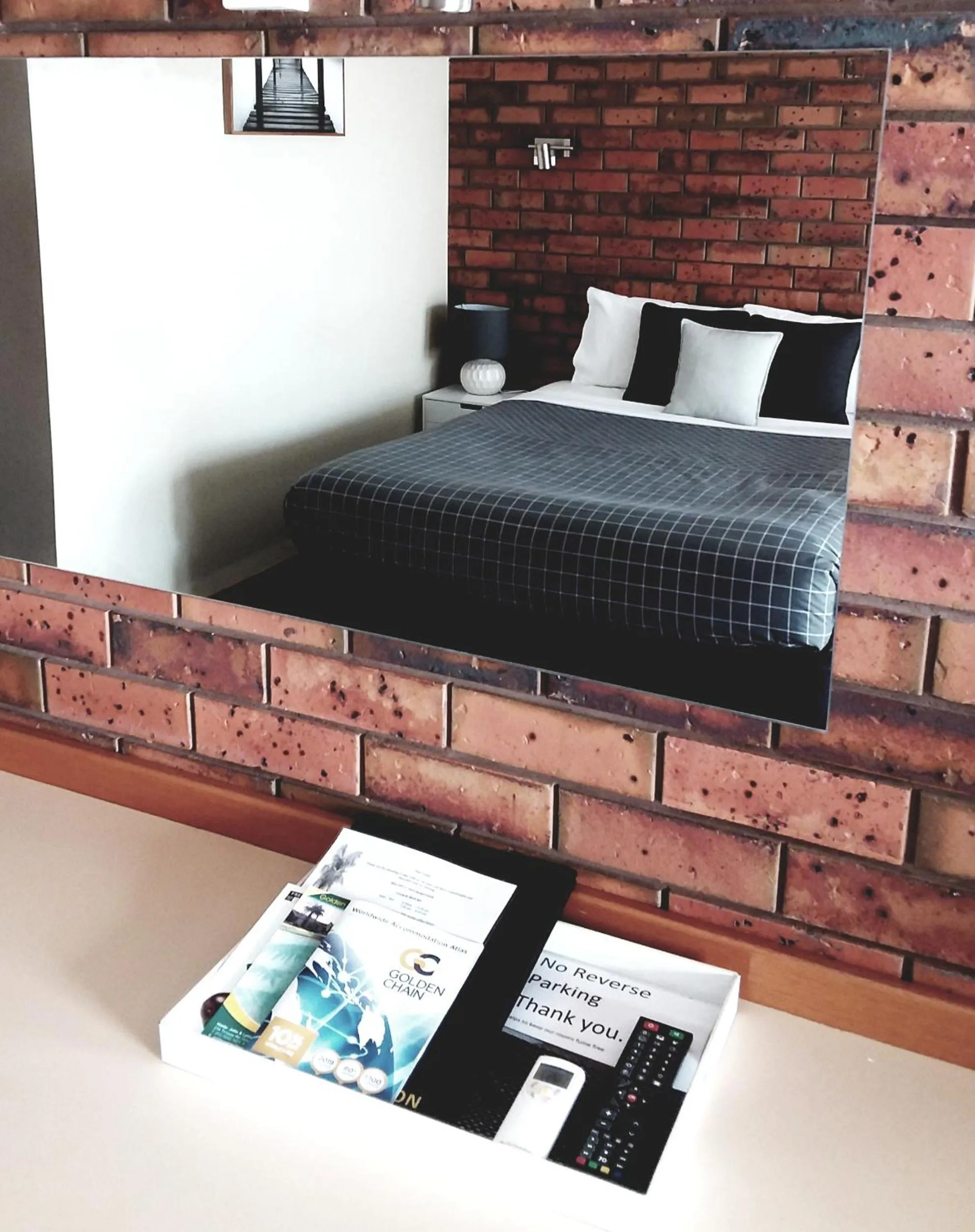 Bed in Golden Palms Motel