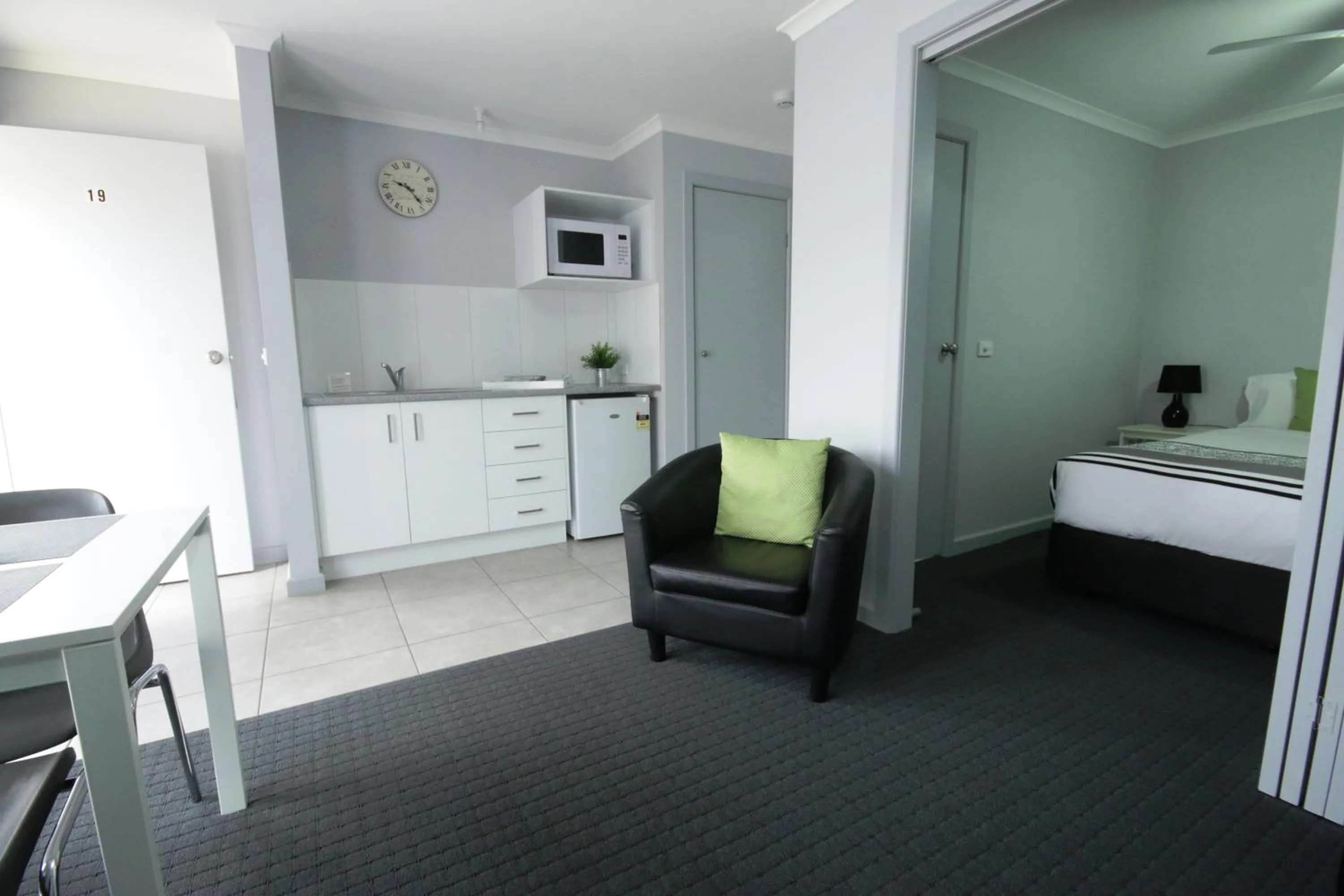 Bed in Golden Palms Motel