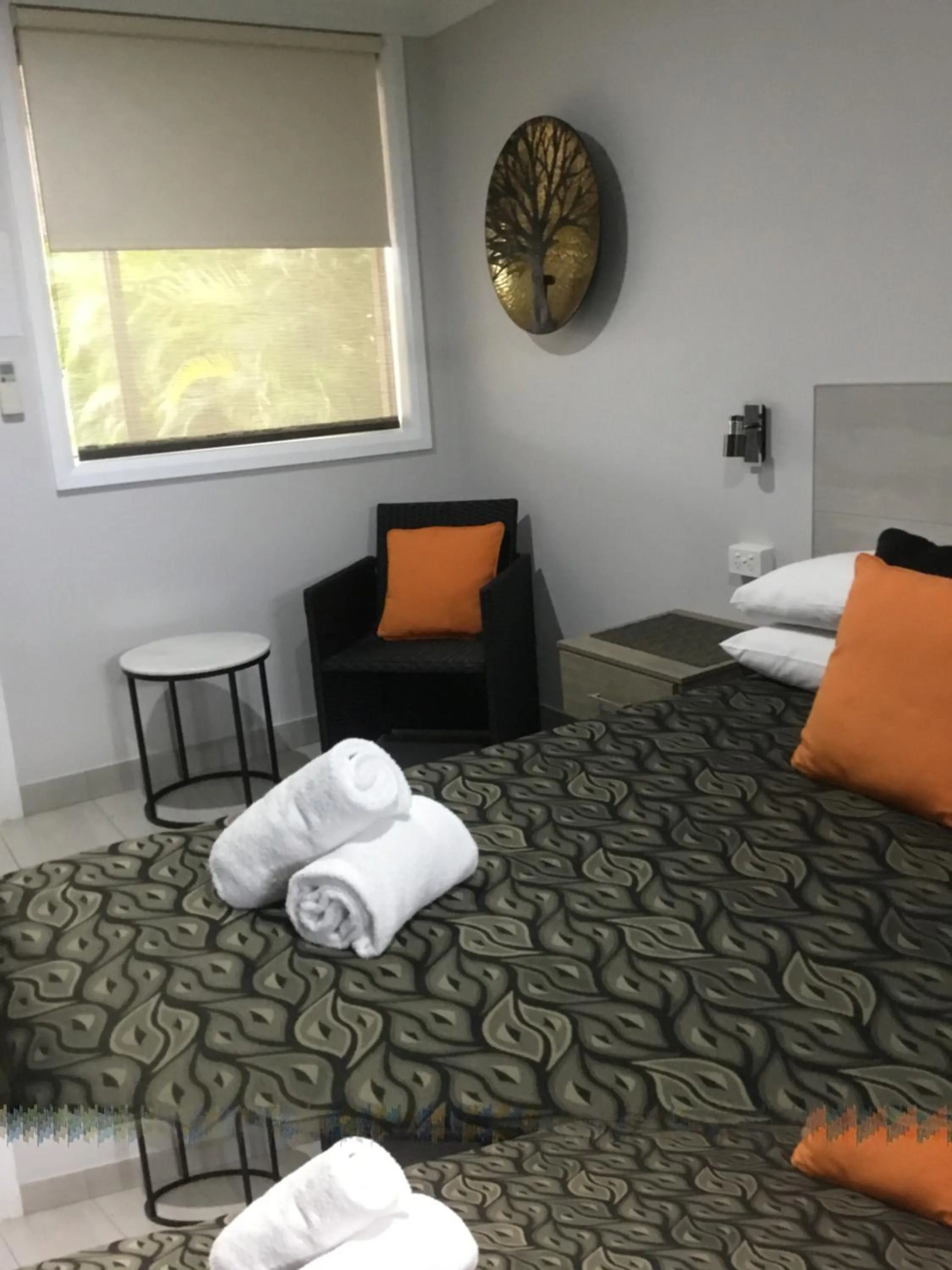 Bed in Golden Palms Motor Inn