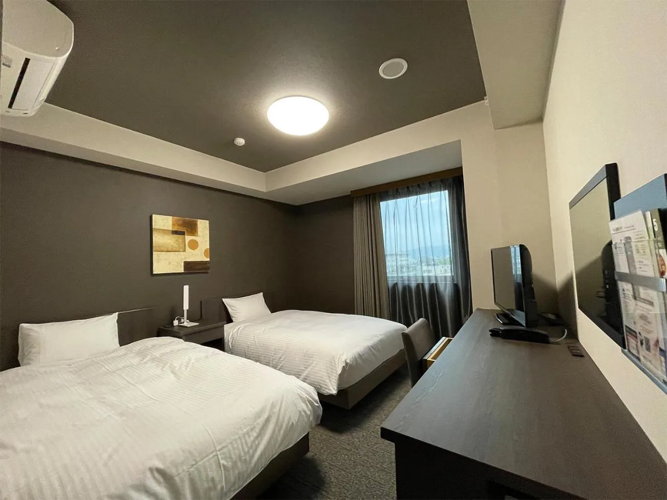 Photo of the whole room, Bed in Hotel Route-Inn Saku Minami Inter